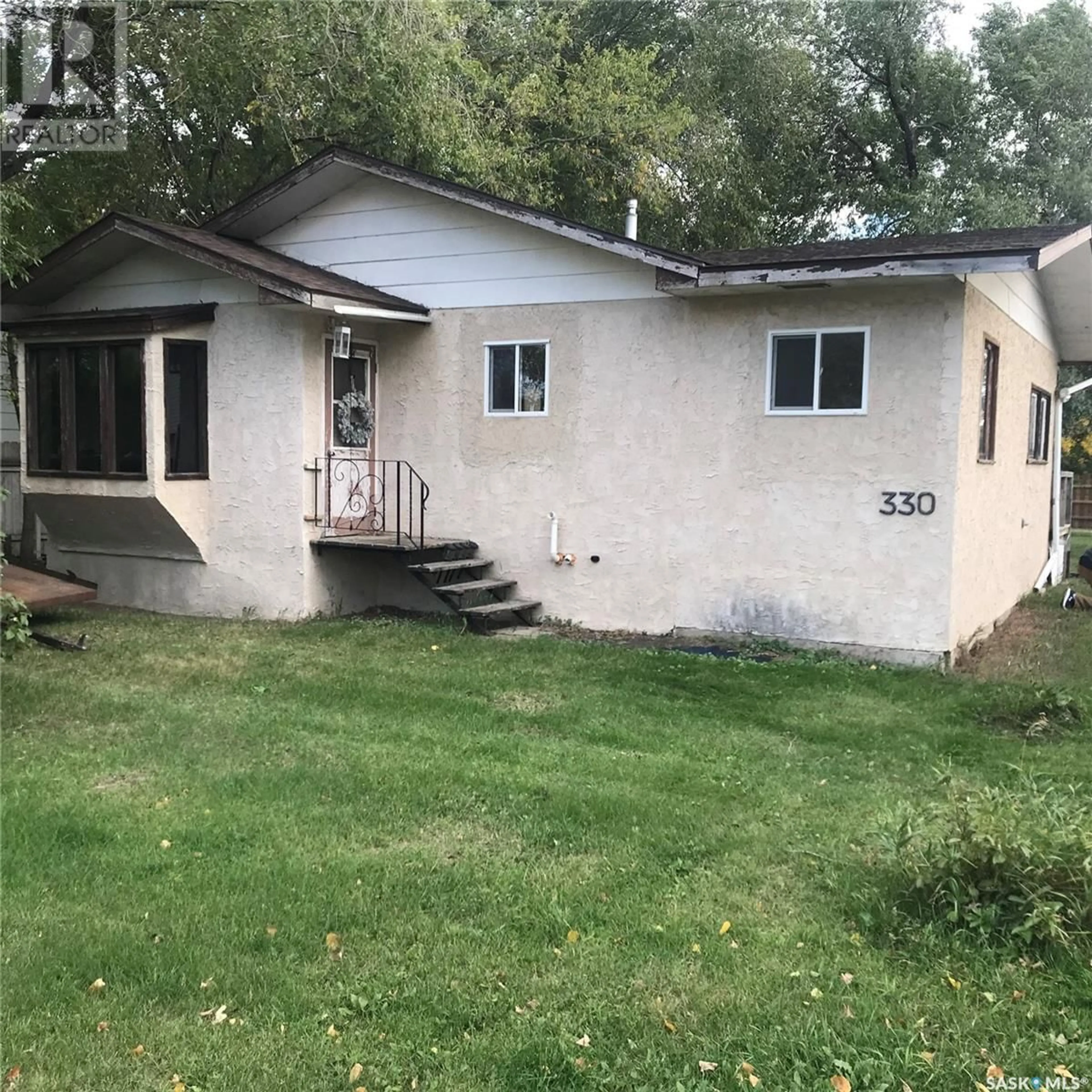 Frontside or backside of a home for 330 2nd STREET S, Martensville Saskatchewan S0K2T0