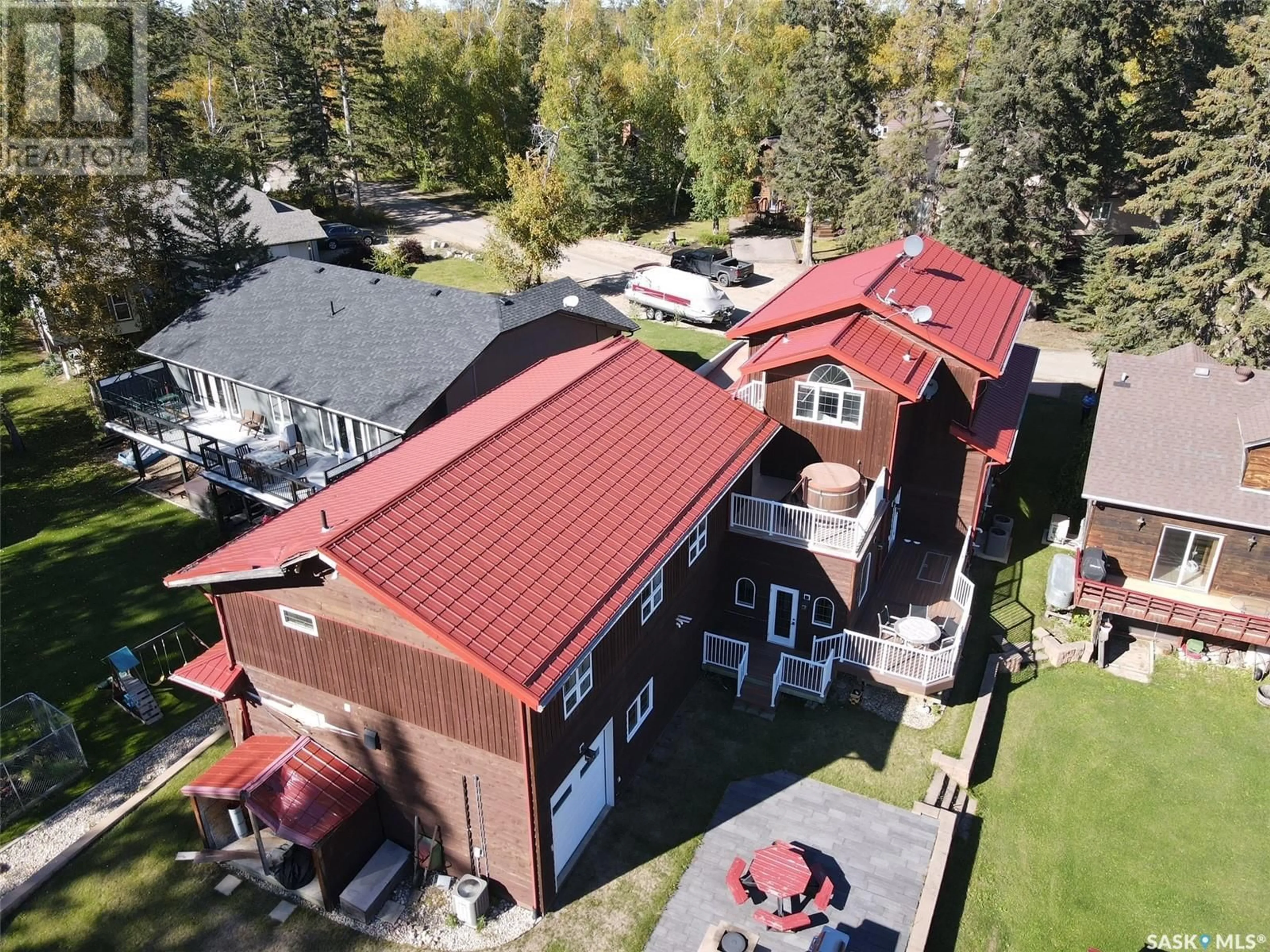 A pic from outside/outdoor area/front of a property/back of a property/a pic from drone, building for 1003 TOGO AVENUE, Kamsack Saskatchewan S0A1S0