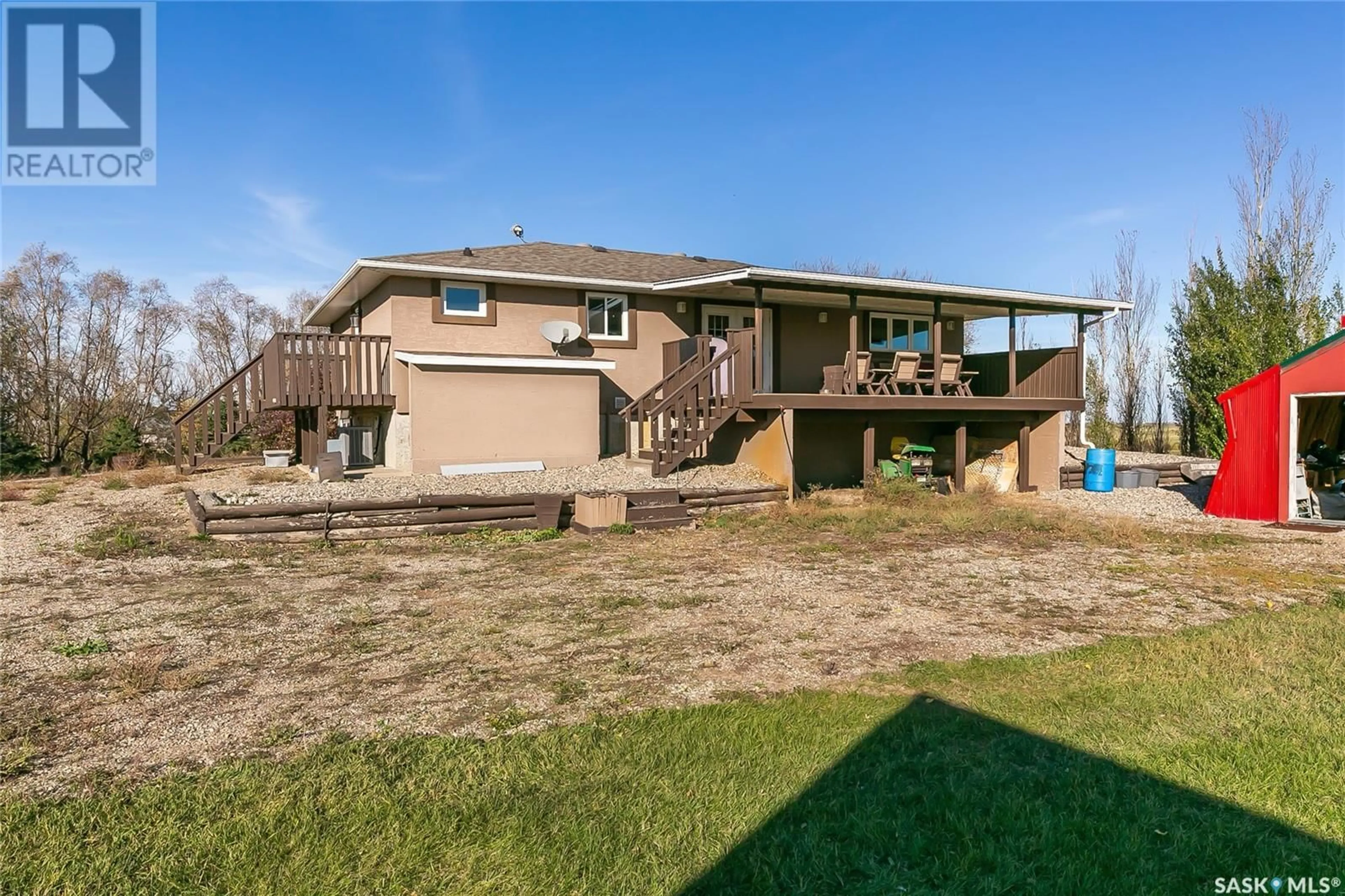 Frontside or backside of a home, the fenced backyard for Horaska Acreage, Lumsden Rm No. 189 Saskatchewan S0G3C0