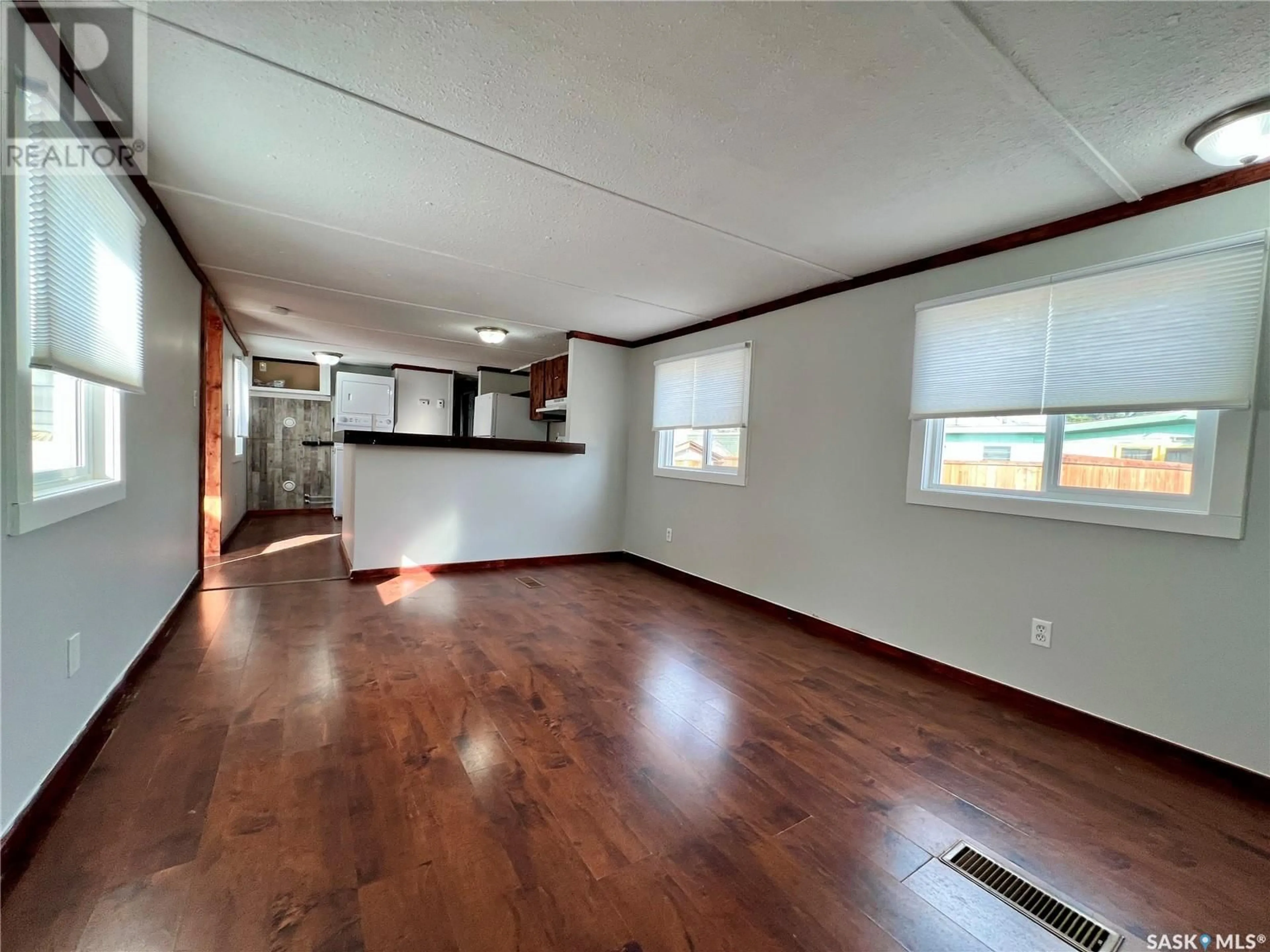 A pic of a room, wood floors for B-12 73 Robert STREET W, Swift Current Saskatchewan S9H3S8