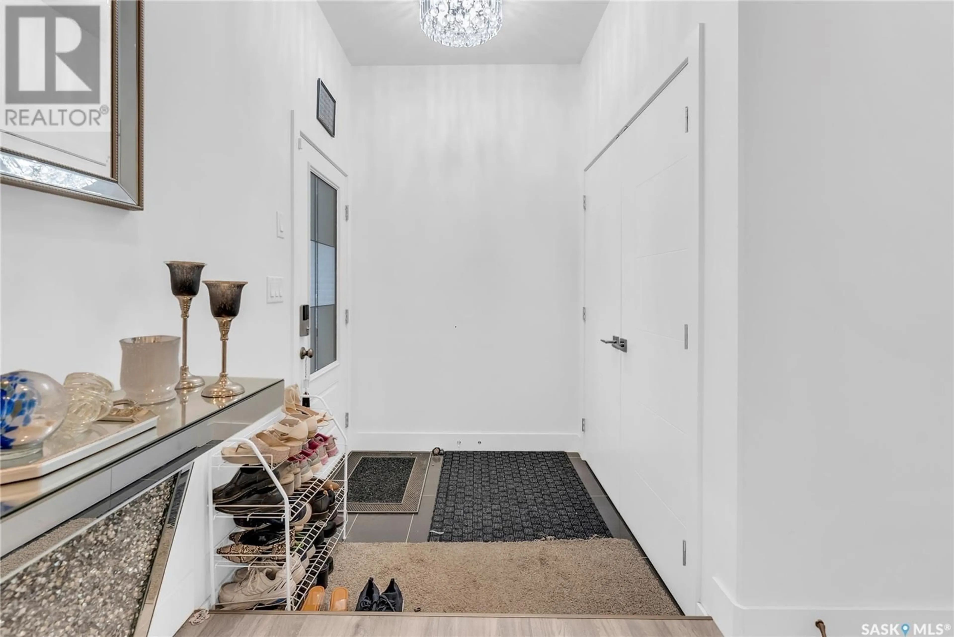 Indoor entryway, wood floors for 208 Thakur STREET, Saskatoon Saskatchewan S7W0V3