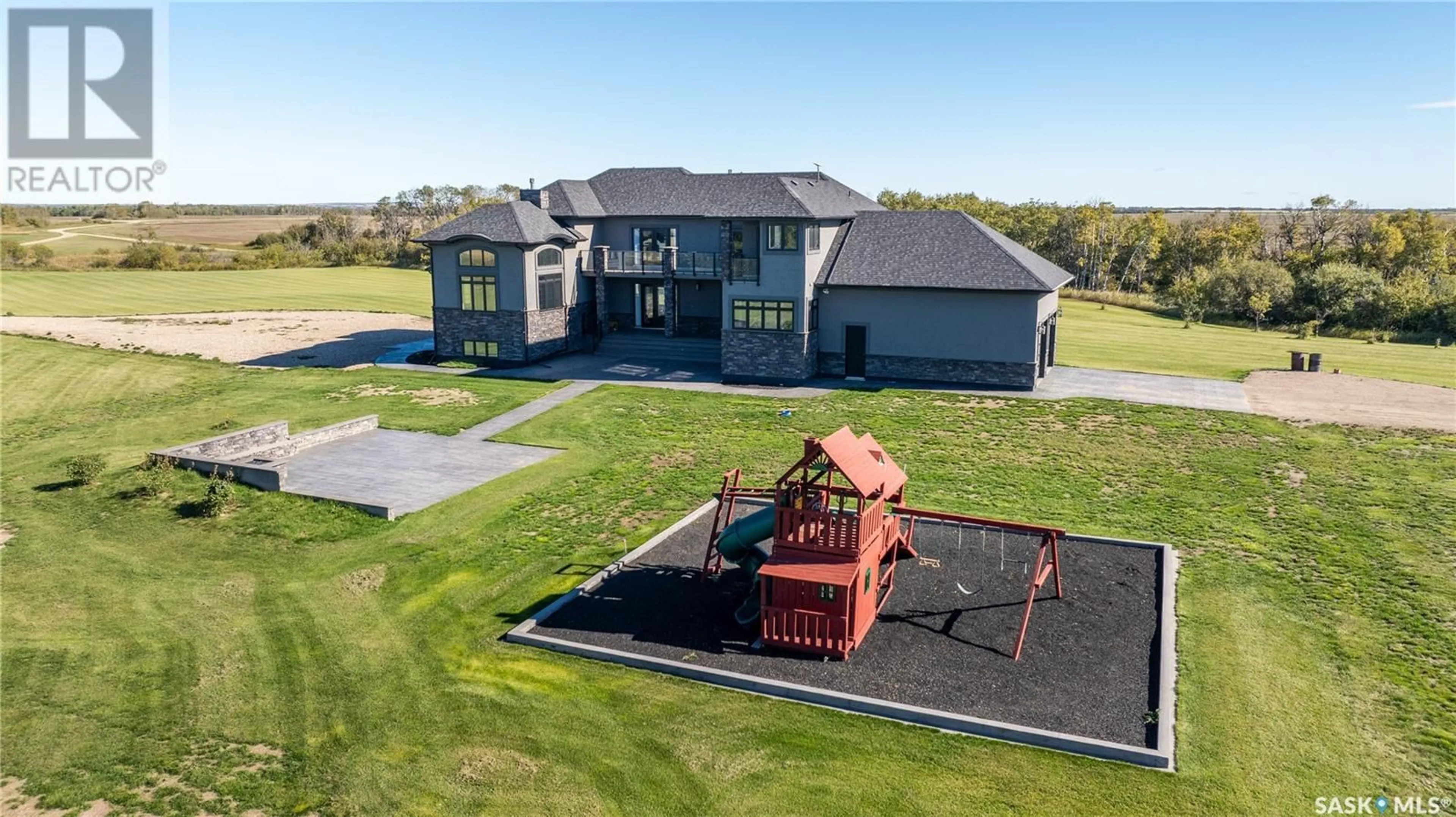 Frontside or backside of a home, the fenced backyard for Saskatchewan Prestige Manor, Douglas Rm No. 436 Saskatchewan S0J1A0