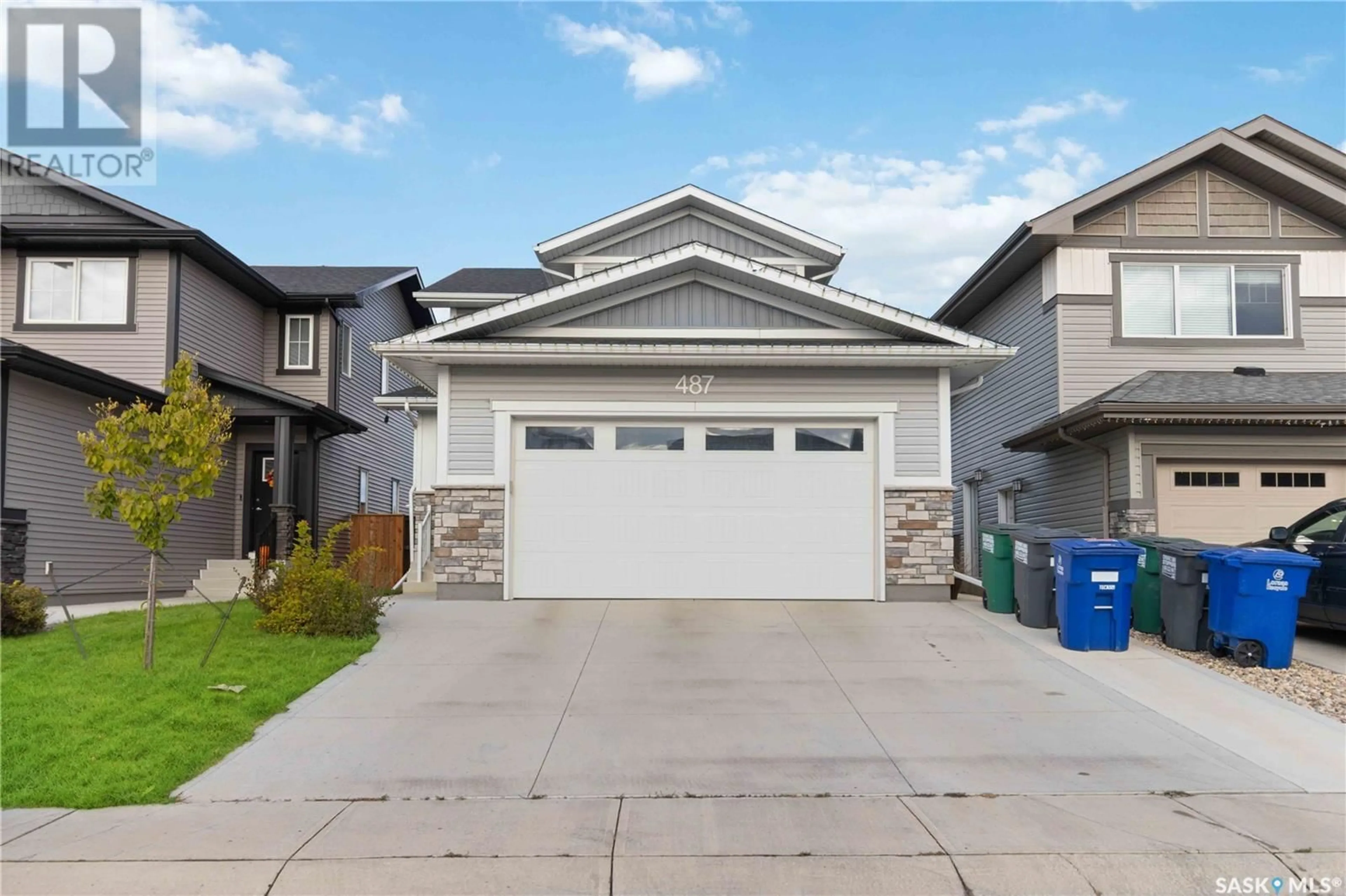 Frontside or backside of a home, the street view for 487 McFaull CRESCENT, Saskatoon Saskatchewan S7V0T1