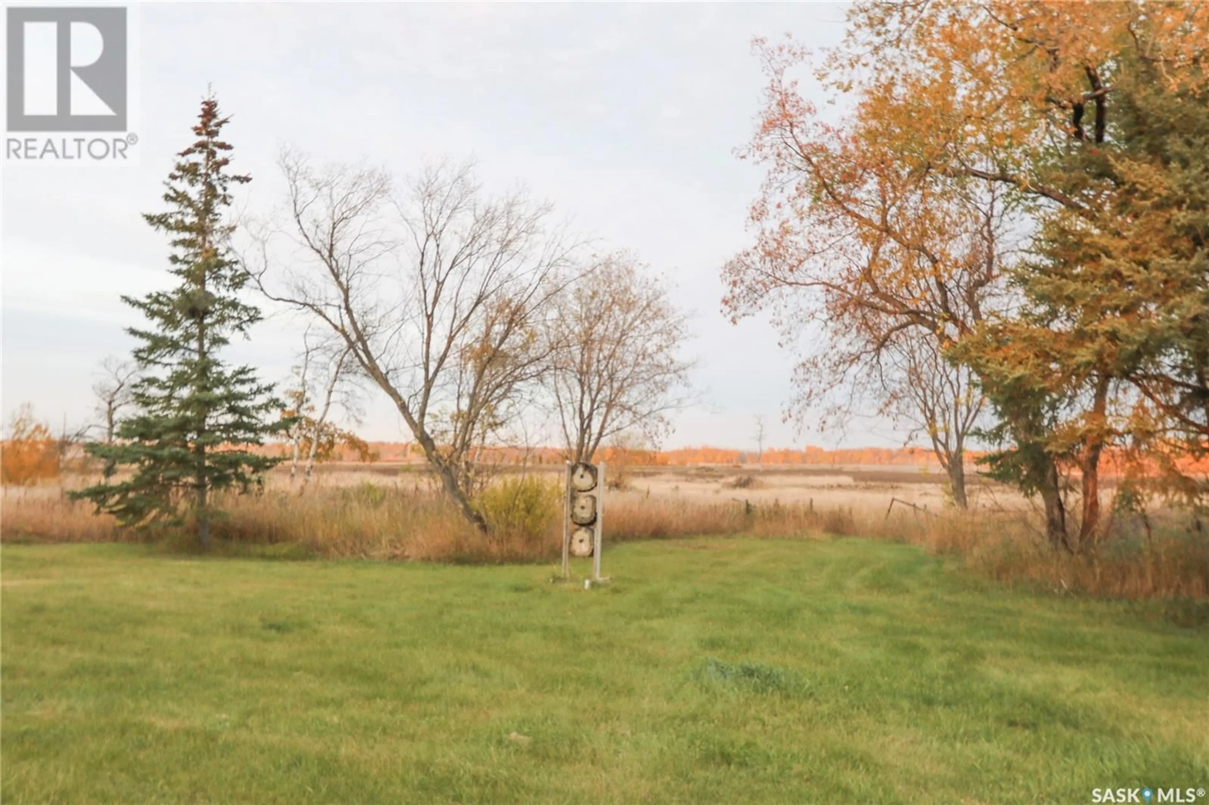 A pic from exterior of the house or condo, the fenced backyard for Clifford Acreage, Orkney Rm No. 244 Saskatchewan S3N1C1