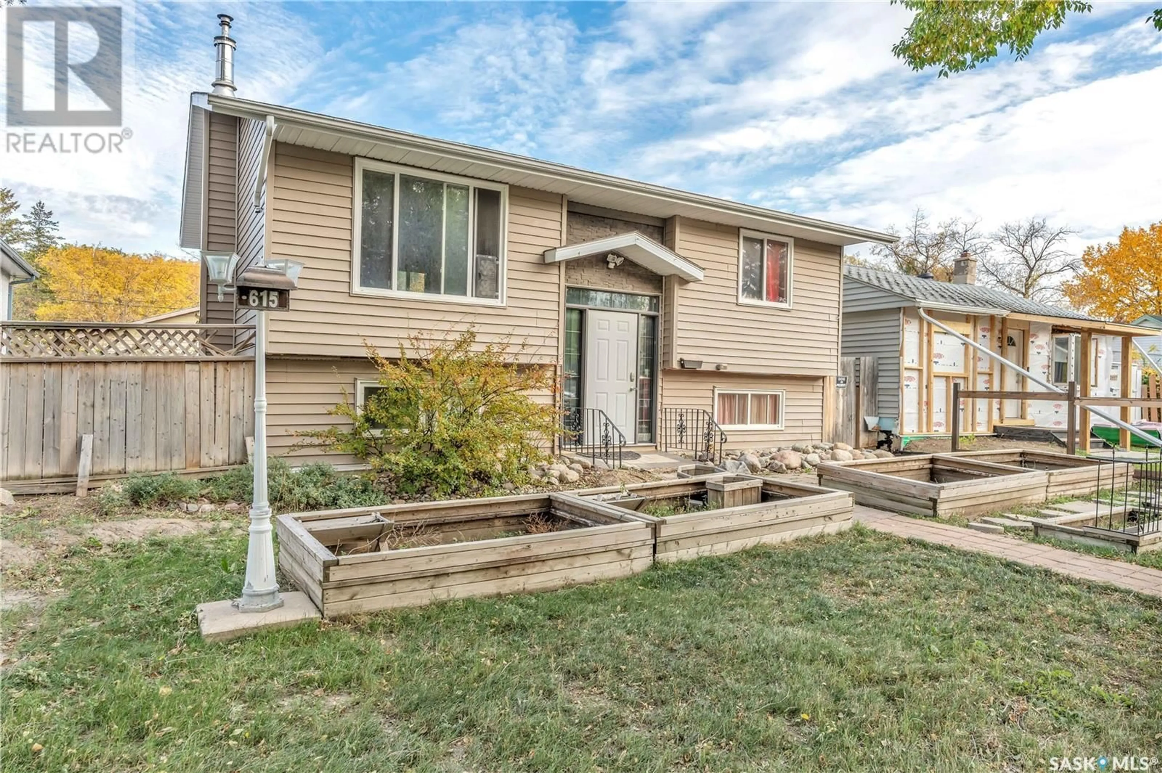 Frontside or backside of a home, the fenced backyard for 615 McTavish STREET, Regina Saskatchewan S4T3T6