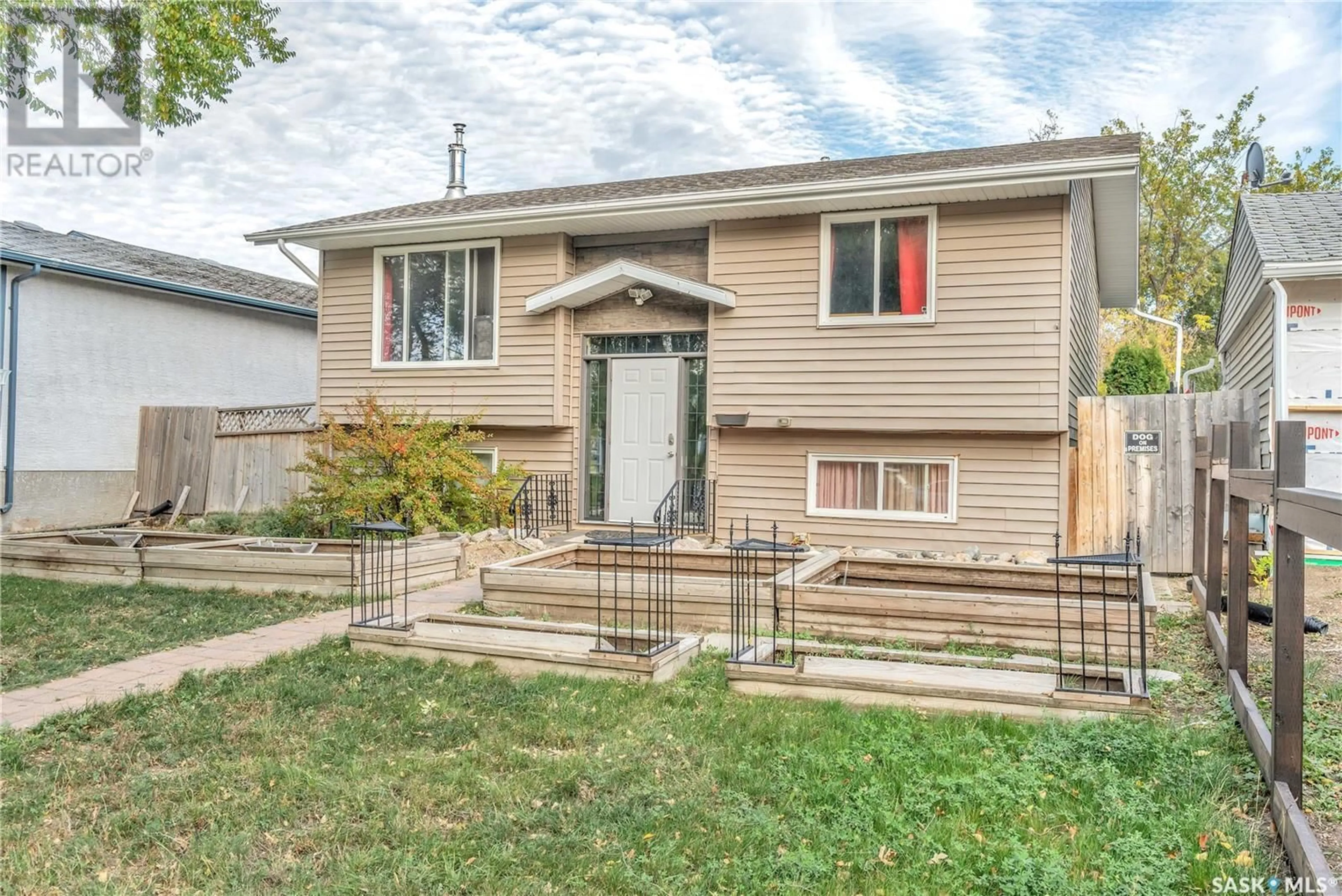 Frontside or backside of a home, the fenced backyard for 615 McTavish STREET, Regina Saskatchewan S4T3T6