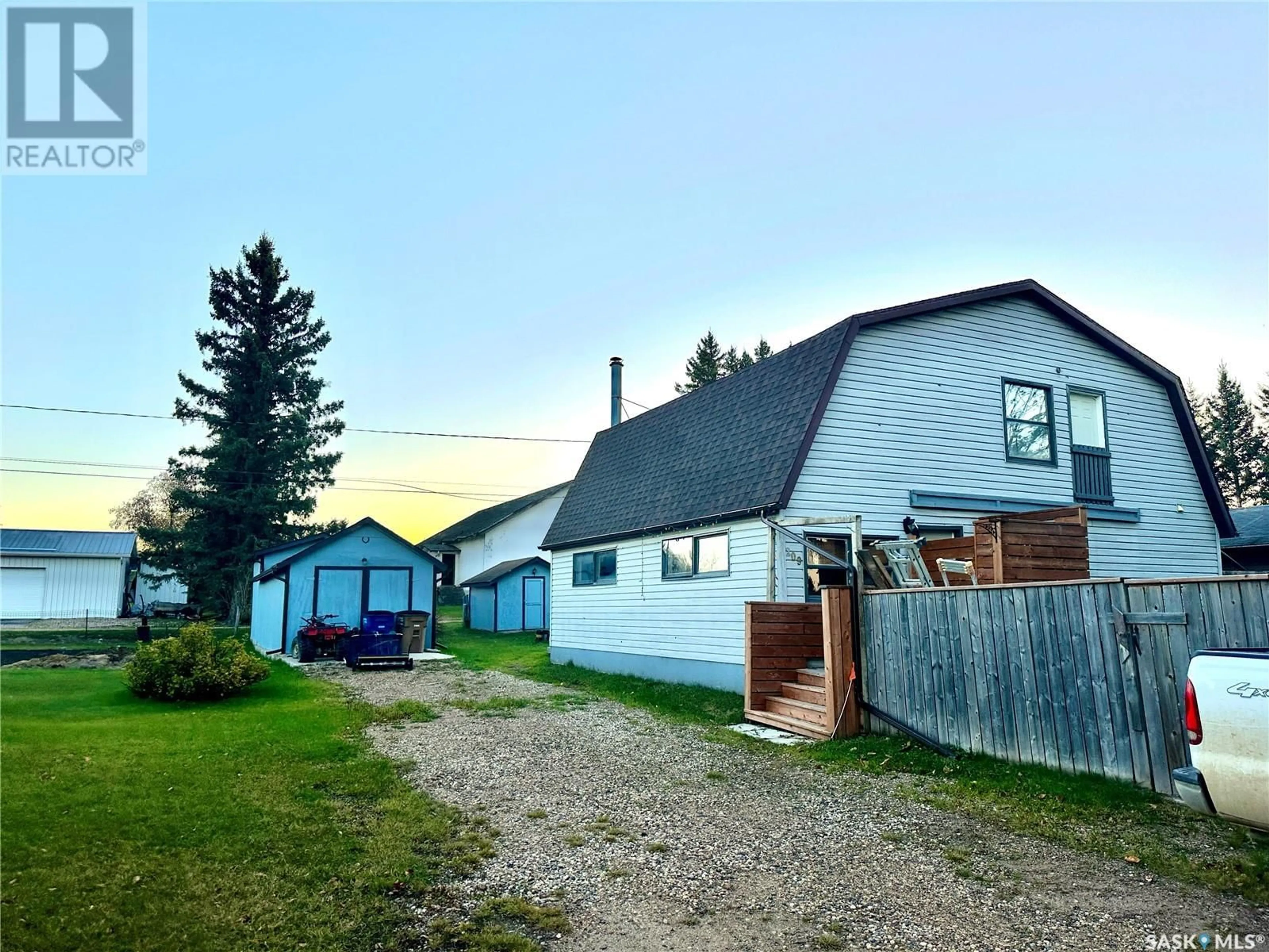 A pic from outside/outdoor area/front of a property/back of a property/a pic from drone, unknown for 209 3RD AVENUE, Big River Saskatchewan S0J0E0