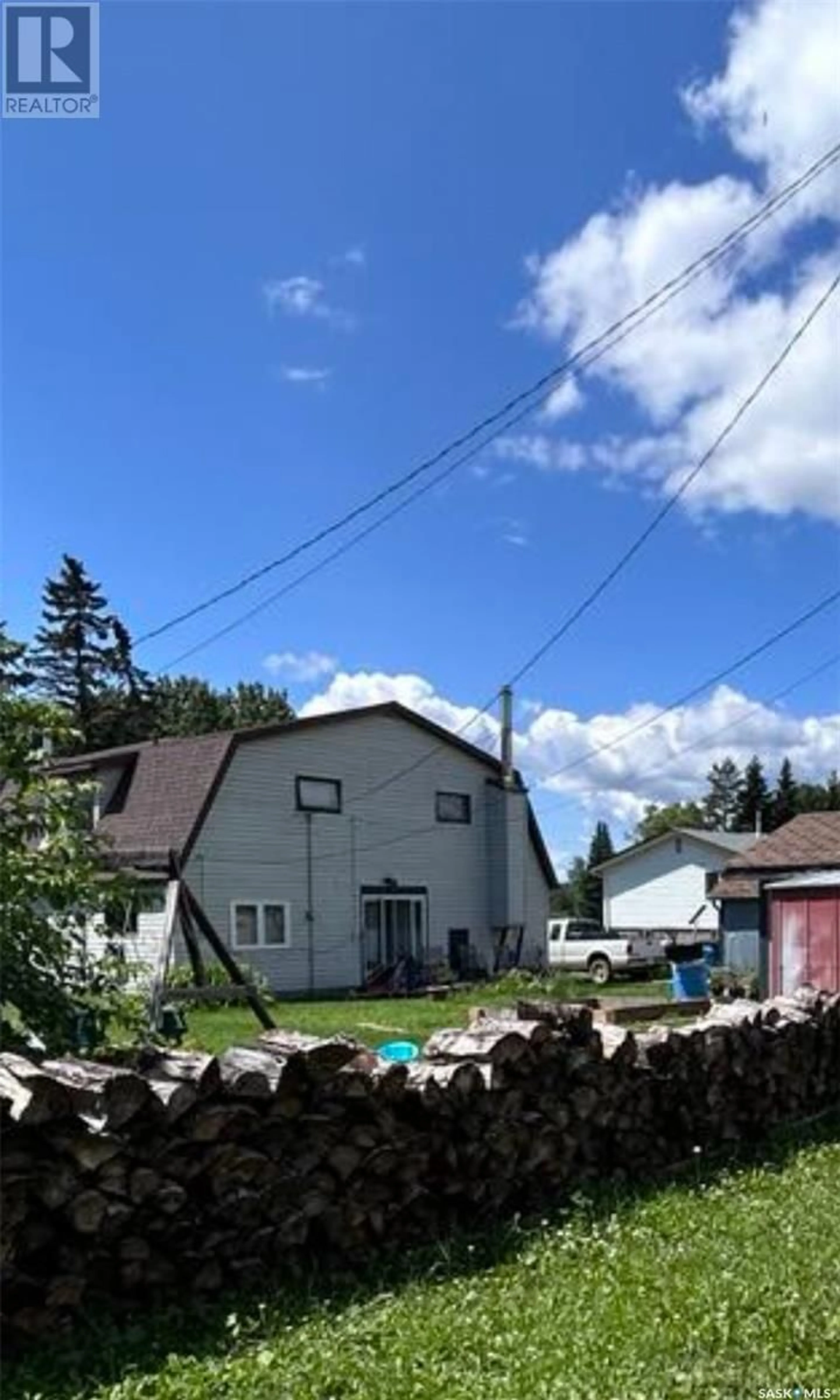 A pic from outside/outdoor area/front of a property/back of a property/a pic from drone, street for 209 3RD AVENUE, Big River Saskatchewan S0J0E0