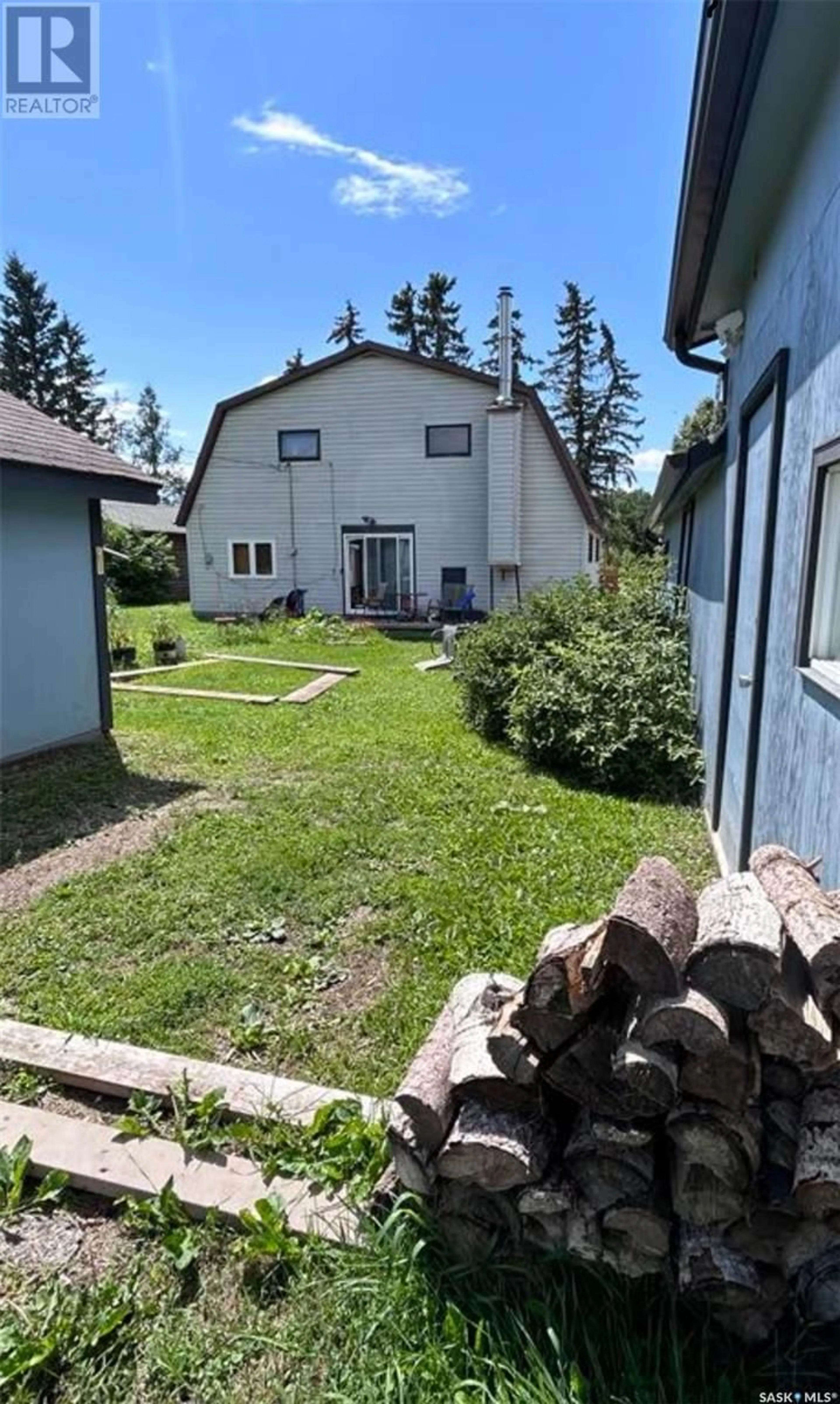 A pic from outside/outdoor area/front of a property/back of a property/a pic from drone, street for 209 3RD AVENUE, Big River Saskatchewan S0J0E0
