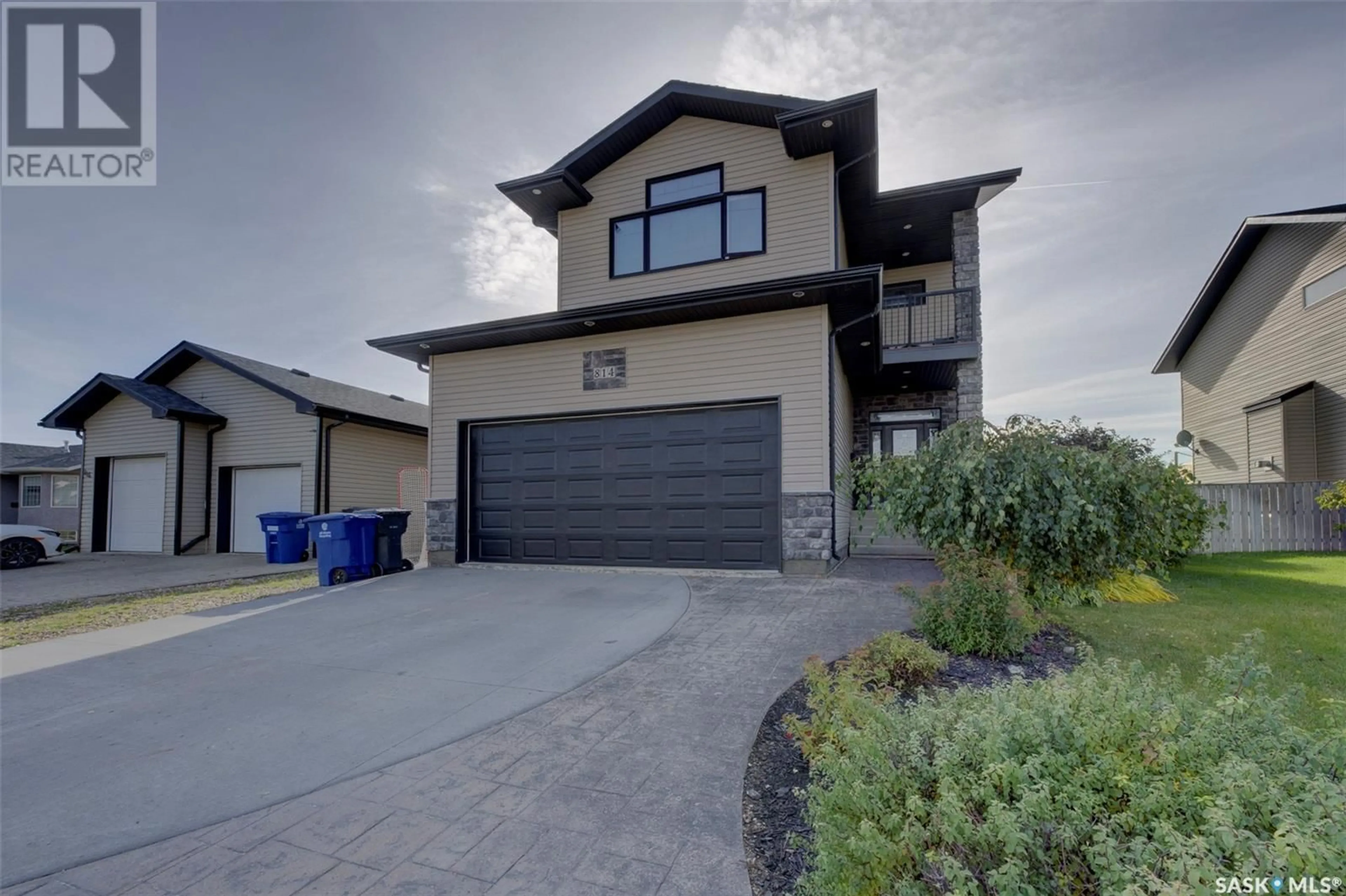 Frontside or backside of a home, the street view for 814 Rock Hill LANE, Martensville Saskatchewan S0K0A2