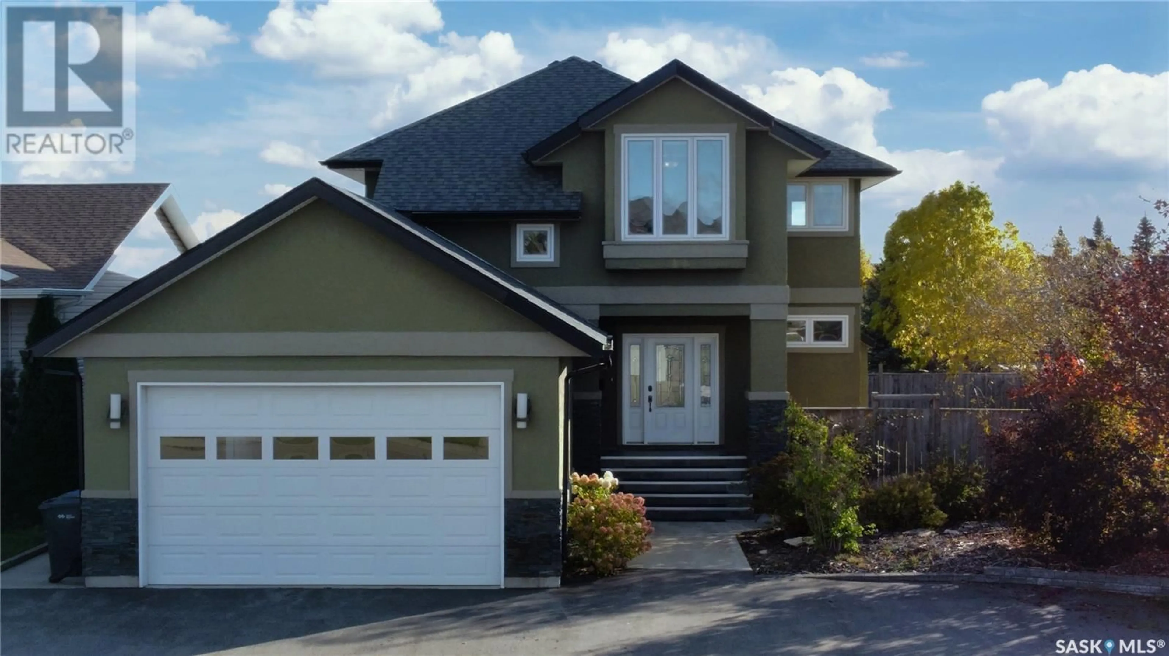 Home with vinyl exterior material, street for 10304 BUNCE CRESCENT, North Battleford Saskatchewan S9A3Y5