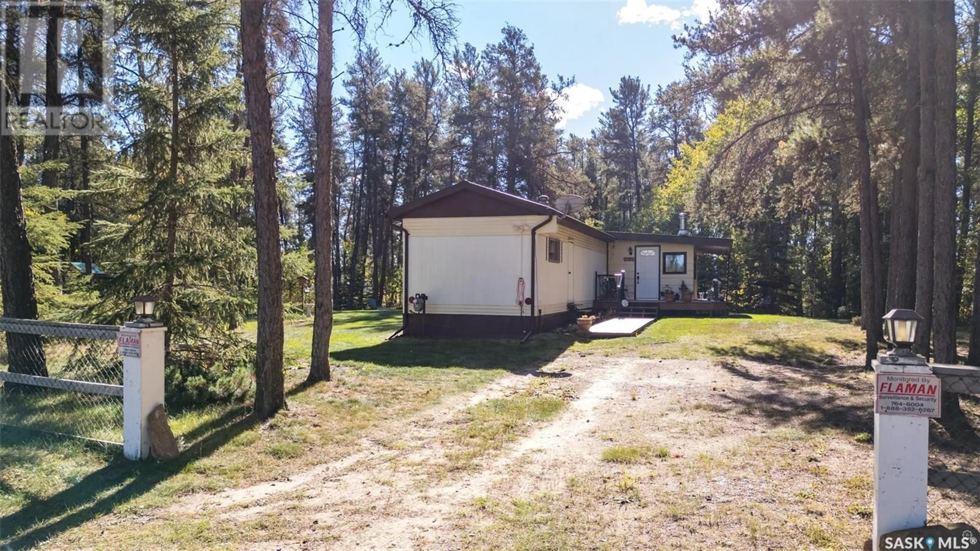 A pic from outside/outdoor area/front of a property/back of a property/a pic from drone, unknown for 2104 15TH STREET, Buckland Rm No. 491 Saskatchewan S0J2N0