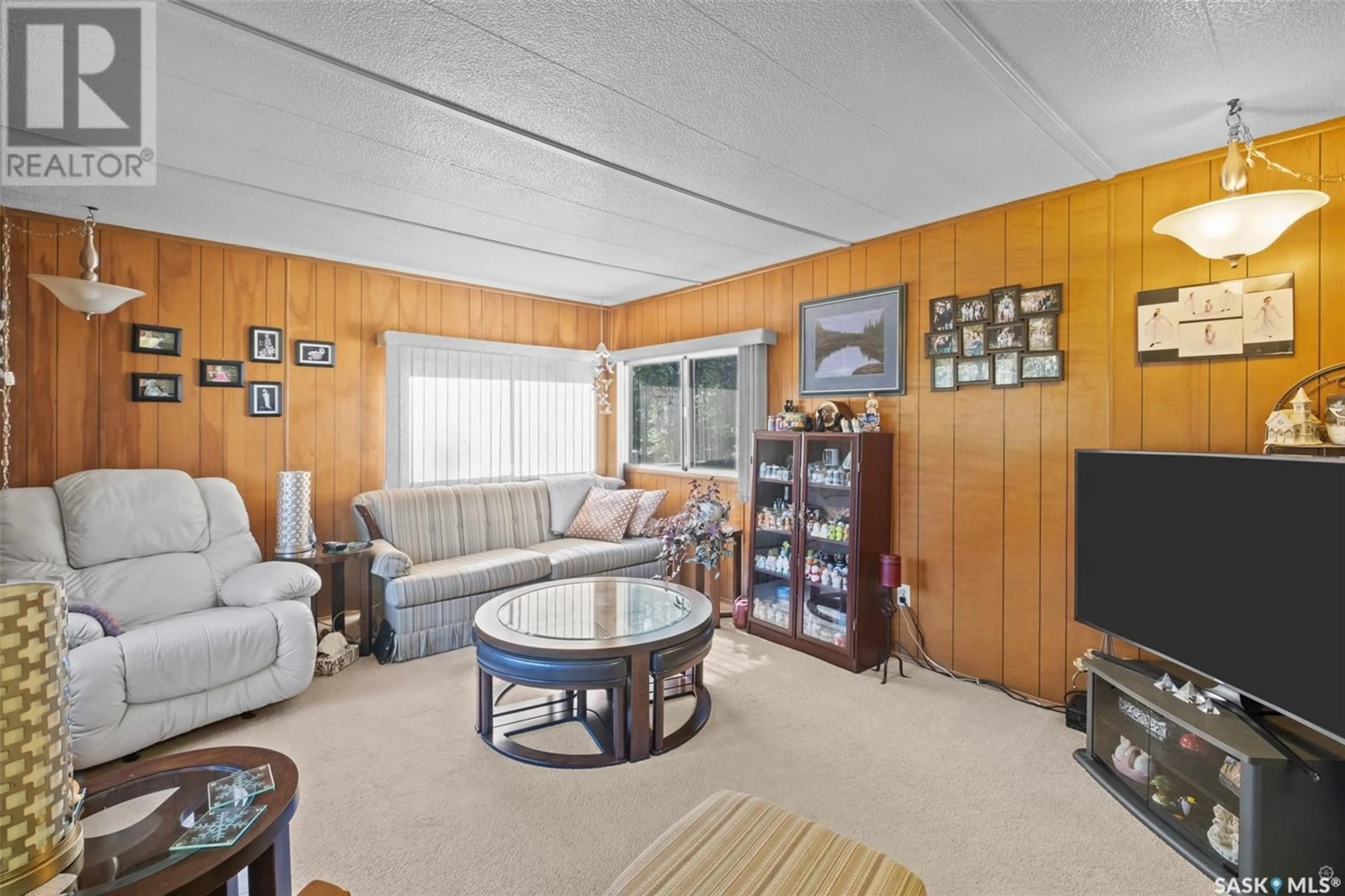 Living room with furniture, unknown for 2104 15TH STREET, Buckland Rm No. 491 Saskatchewan S0J2N0