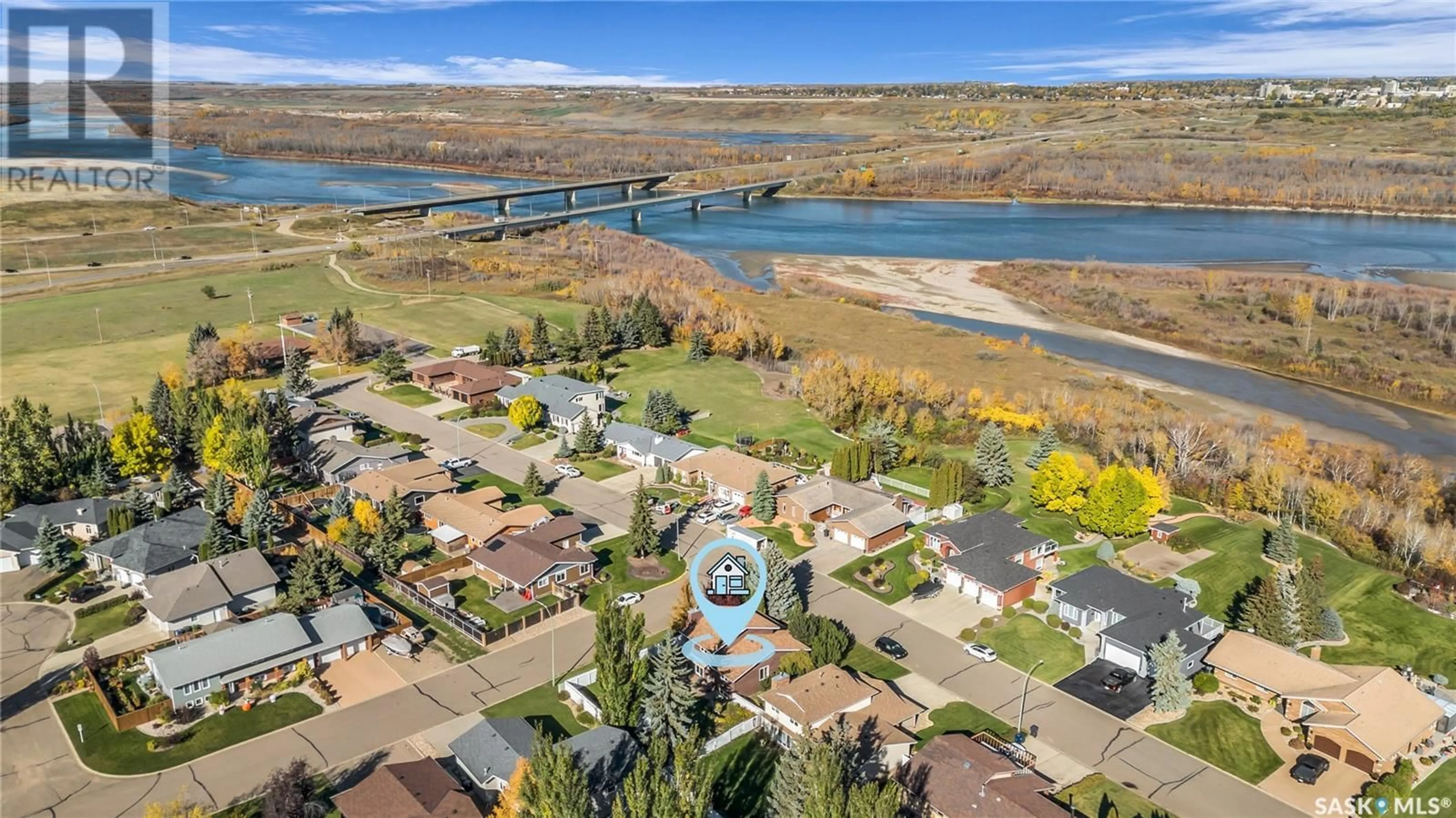 A pic from outside/outdoor area/front of a property/back of a property/a pic from drone, water/lake/river/ocean view for 221 Riverbend CRESCENT, Battleford Saskatchewan S0M0E0