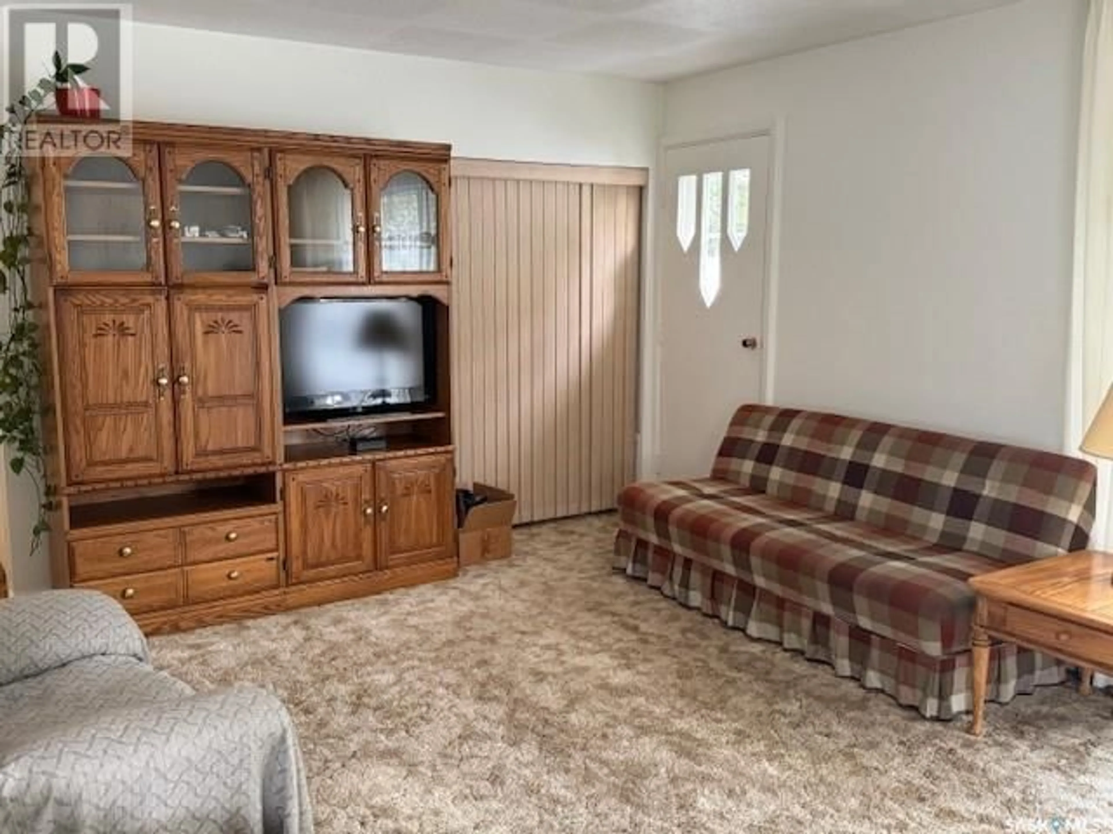 Living room with furniture, unknown for 1462 108TH STREET, North Battleford Saskatchewan S9A2B8