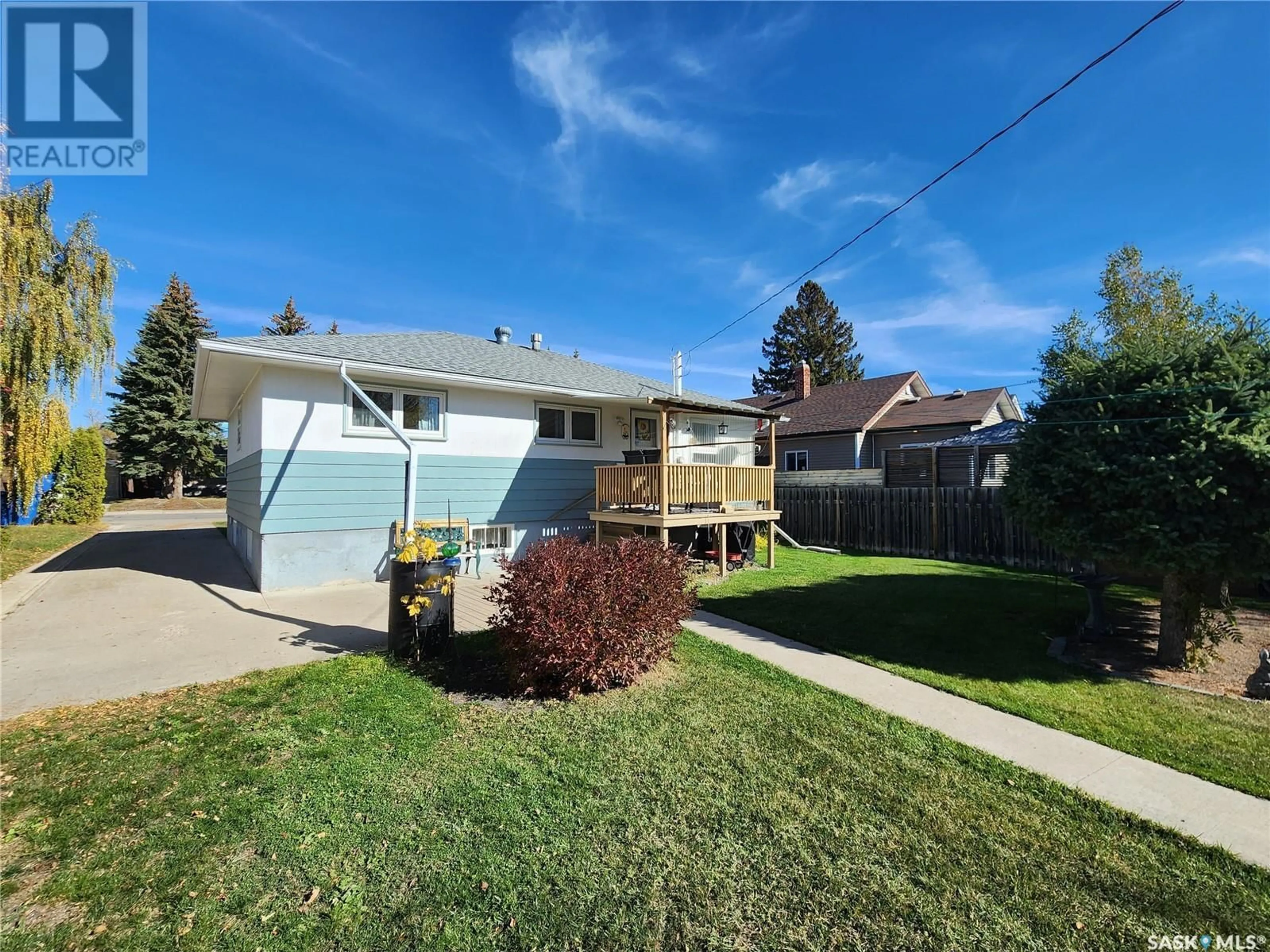 Frontside or backside of a home, the fenced backyard for 339 7th AVENUE E, Melville Saskatchewan S0A2P0