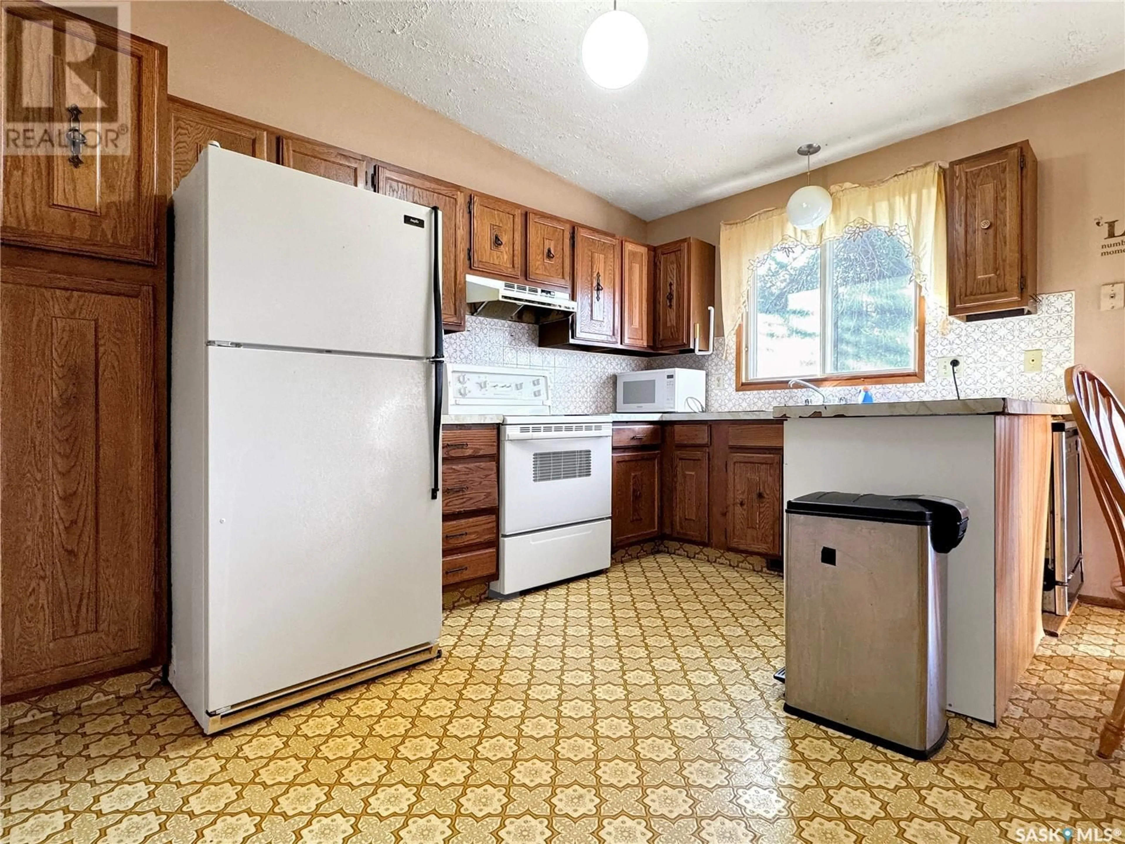 Standard kitchen, wood floors, cottage for 503 Steele STREET, Cut Knife Saskatchewan S0M0N0