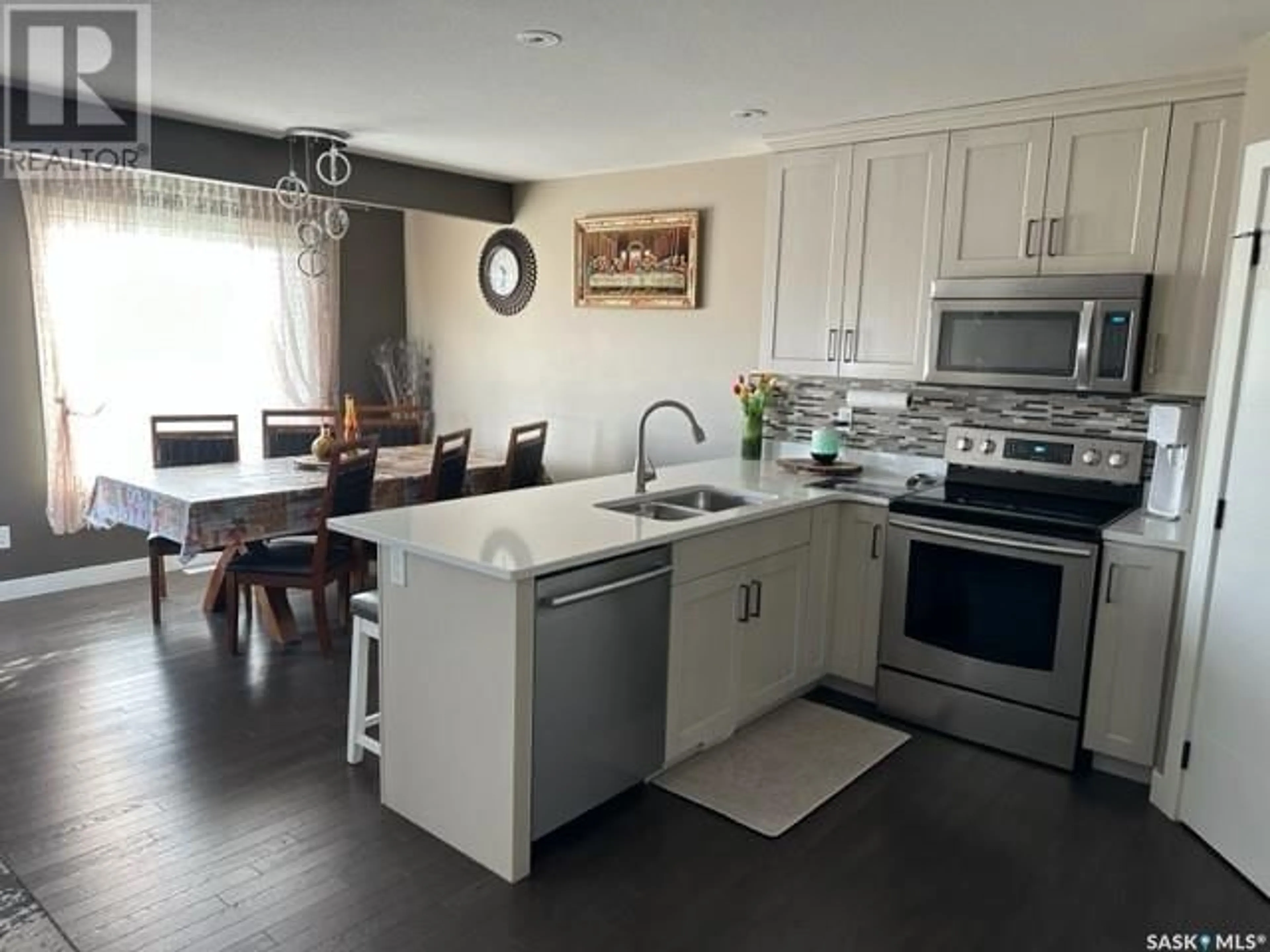 Open concept kitchen for 345 Bassett ROAD, Martensville Saskatchewan S0K0A2