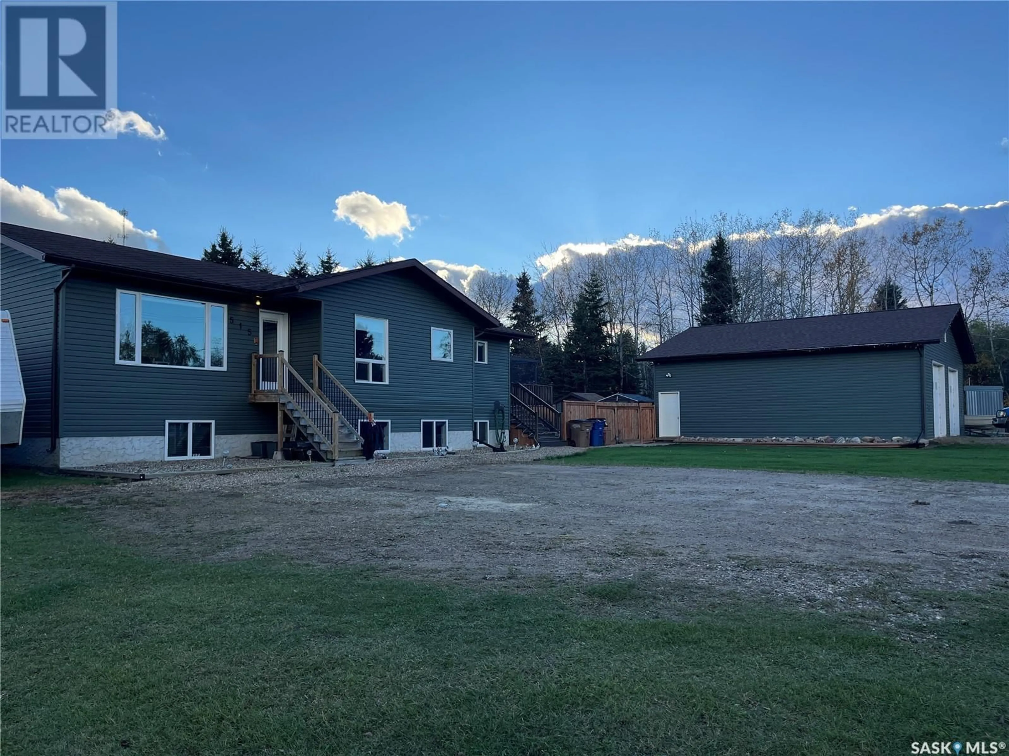 A pic from outside/outdoor area/front of a property/back of a property/a pic from drone, mountain view for 515 FORBES STREET, Big River Saskatchewan S0J0E0