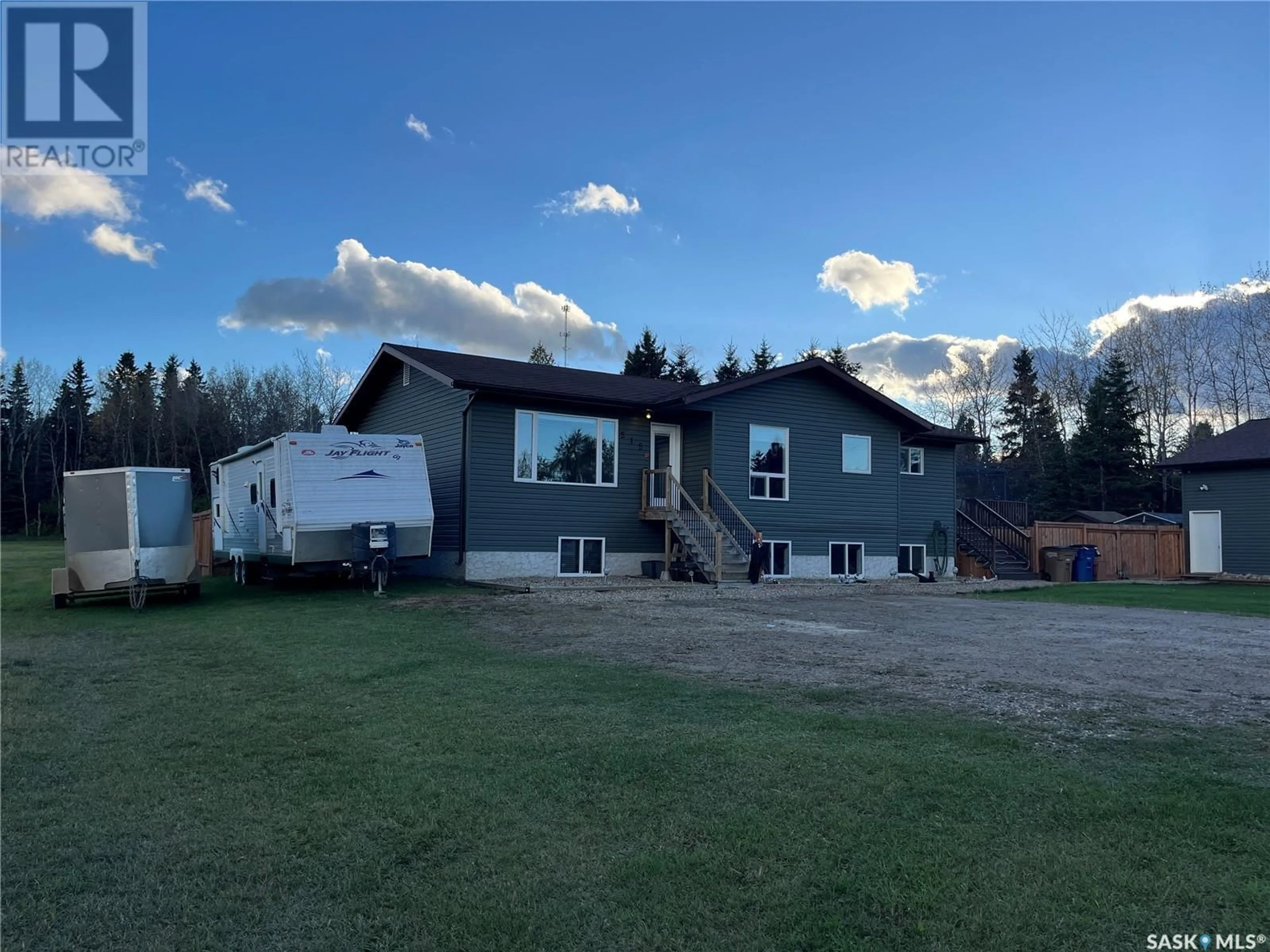 A pic from outside/outdoor area/front of a property/back of a property/a pic from drone, building for 515 FORBES STREET, Big River Saskatchewan S0J0E0