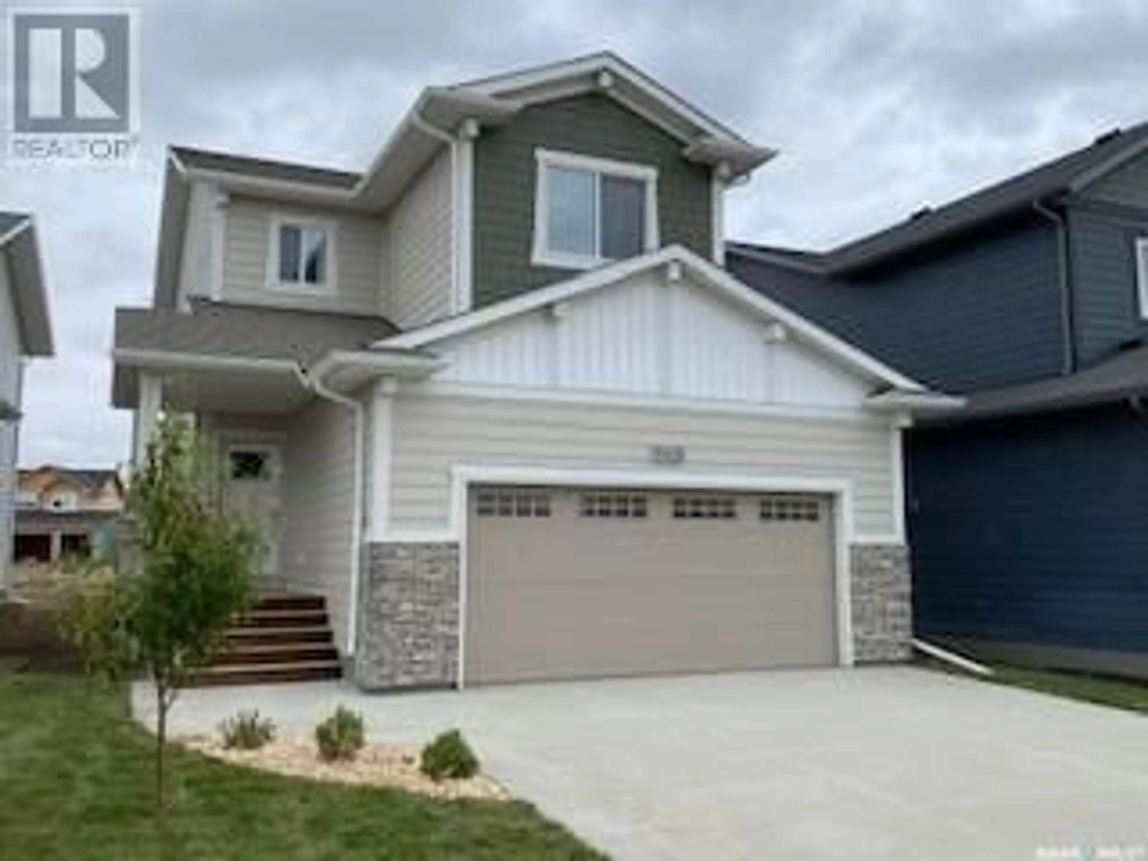 Frontside or backside of a home, the street view for 122 Antonini COURT, Saskatoon Saskatchewan S7L7P2