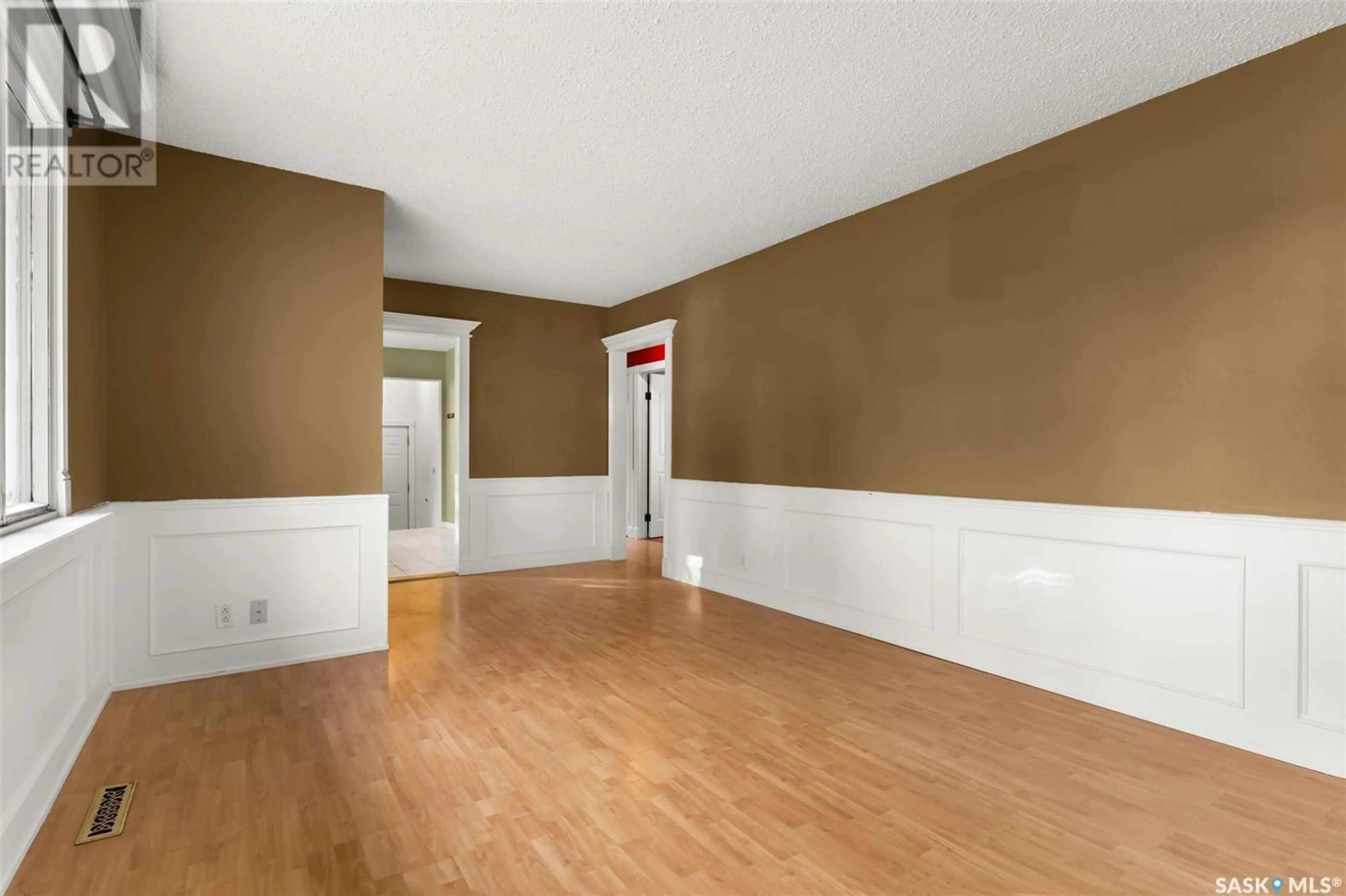 A pic of a room, wood floors for 224 Rae STREET, Regina Saskatchewan S4R3L9