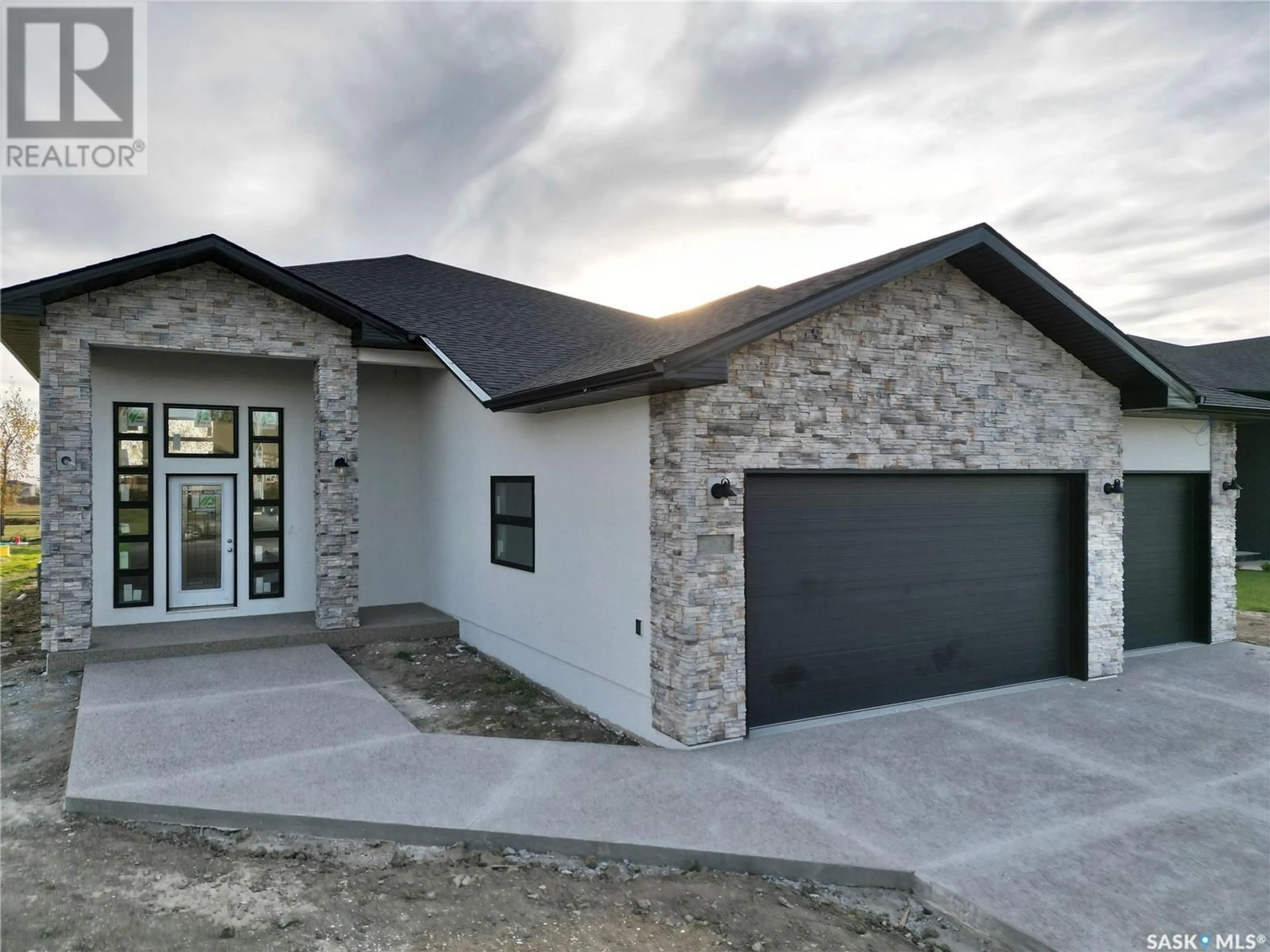 Frontside or backside of a home, the front or back of building for 360 Emerald Park ROAD, Emerald Park Saskatchewan S4L0E7