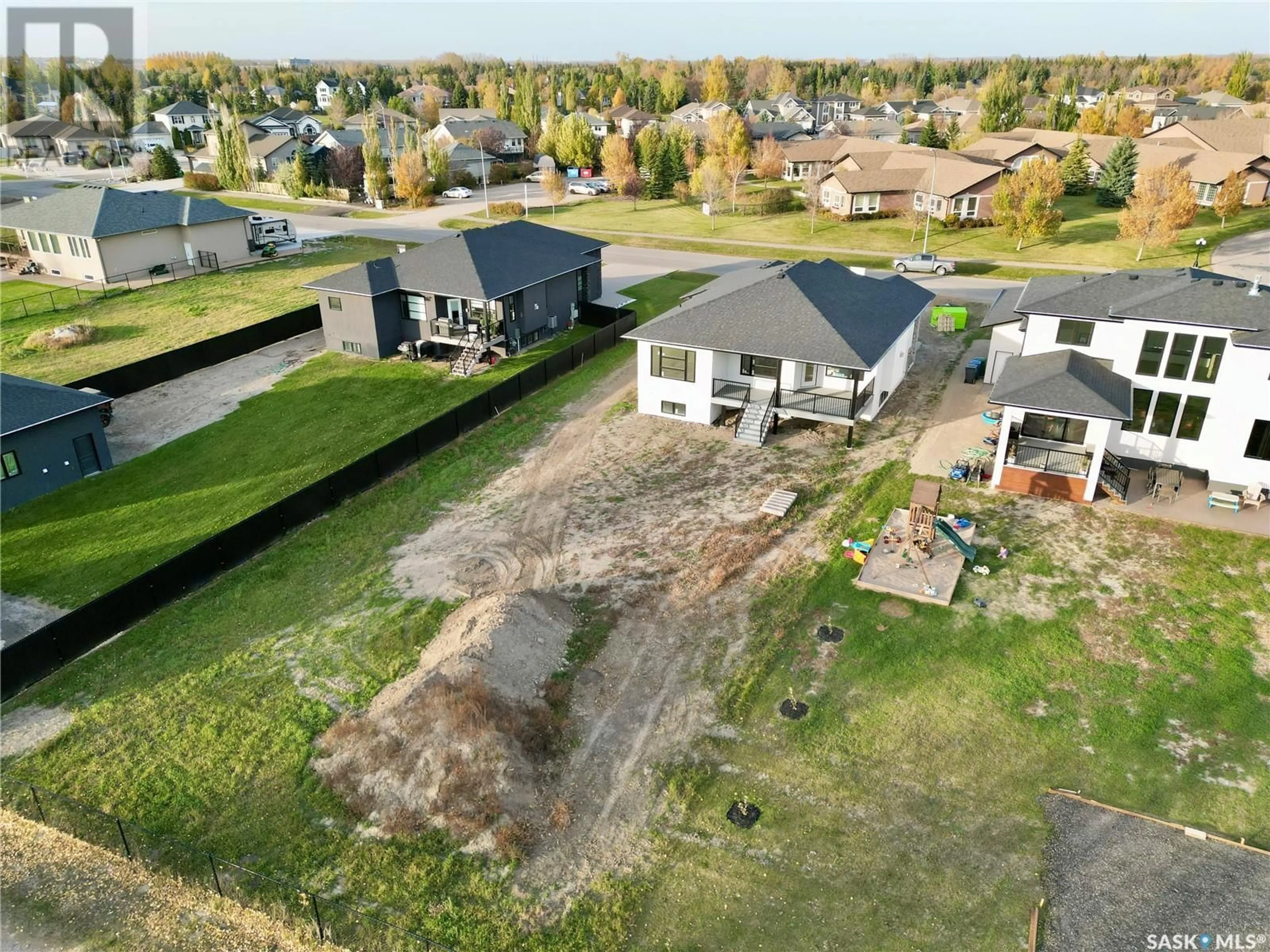 Frontside or backside of a home, the fenced backyard for 360 Emerald Park ROAD, Emerald Park Saskatchewan S4L0E7