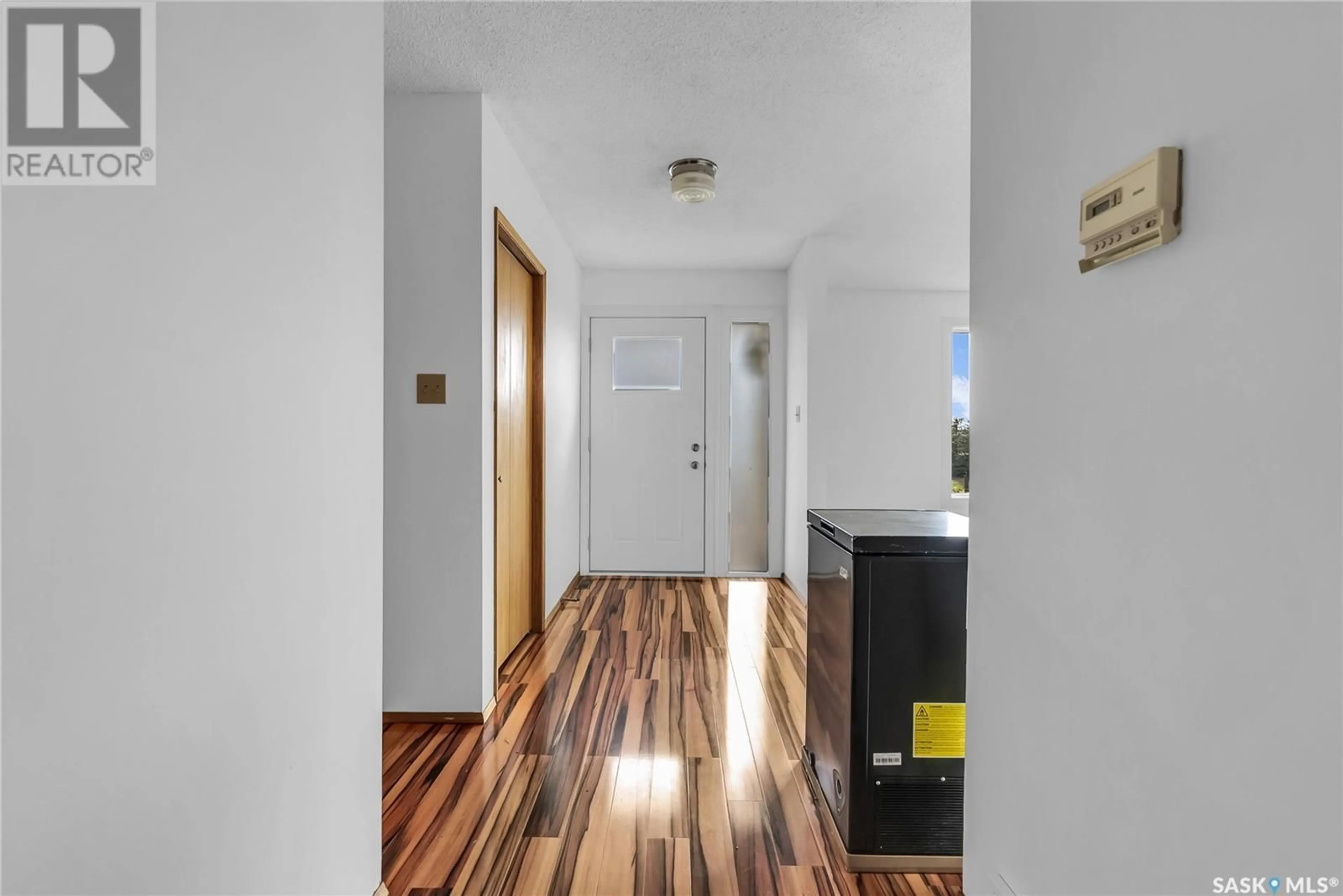 Indoor entryway, wood floors for Trotchie Acreage, Corman Park Rm No. 344 Saskatchewan S0K0J0