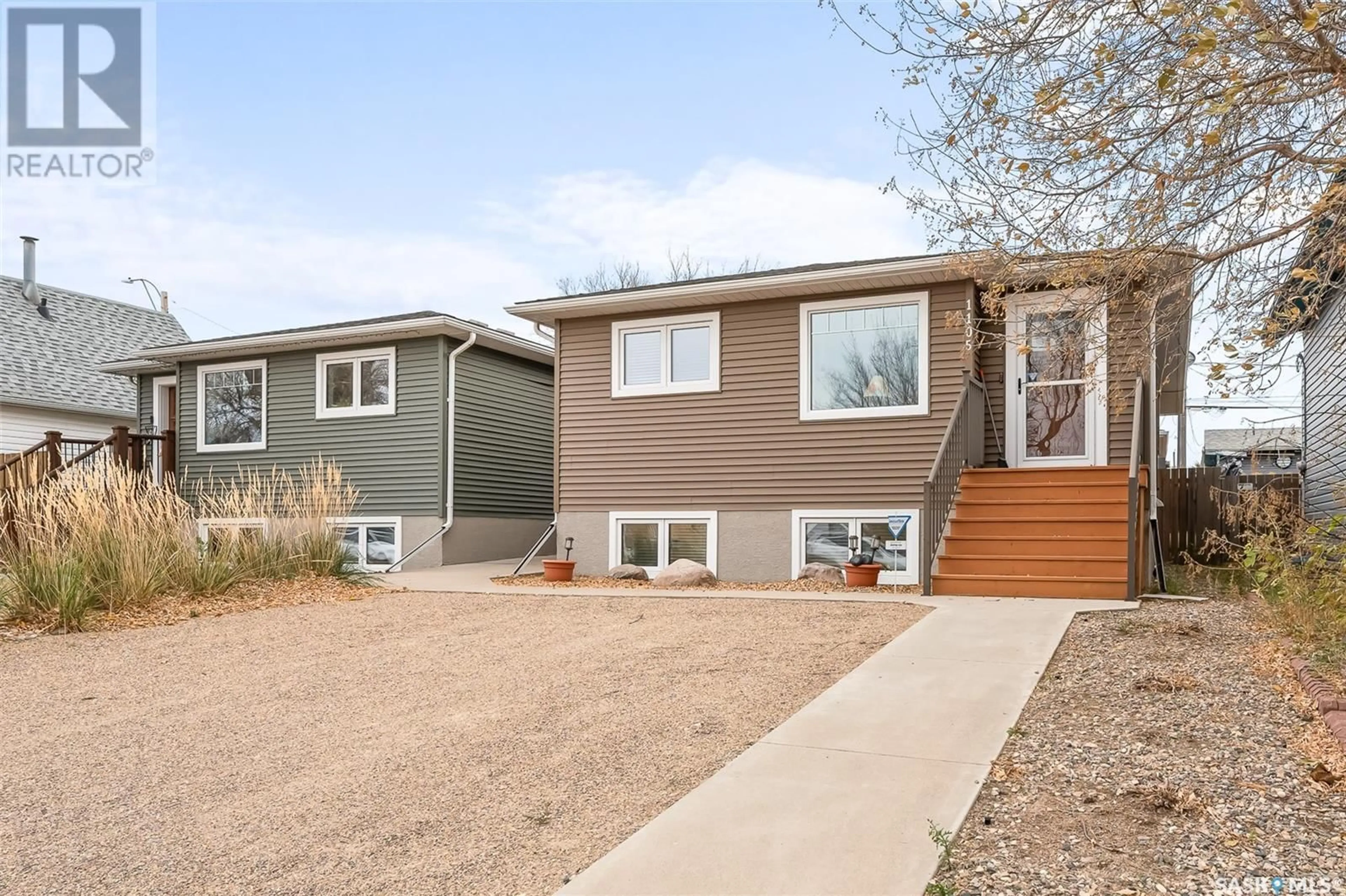 Frontside or backside of a home, the fenced backyard for 1105 Lillooet STREET W, Moose Jaw Saskatchewan S6H5A2