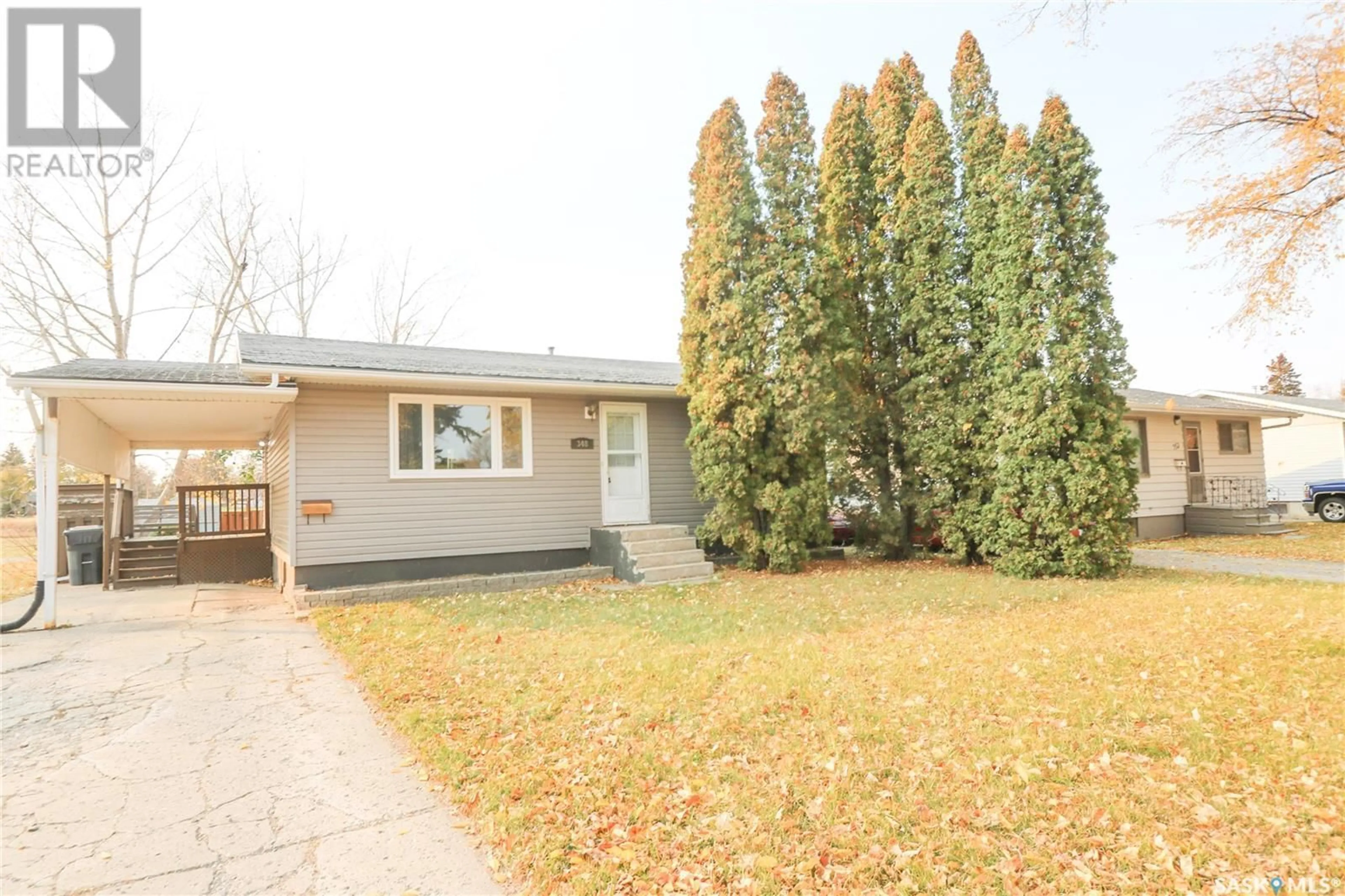 A pic from exterior of the house or condo, the fenced backyard for 348 Myrtle AVENUE, Yorkton Saskatchewan S3N1R9