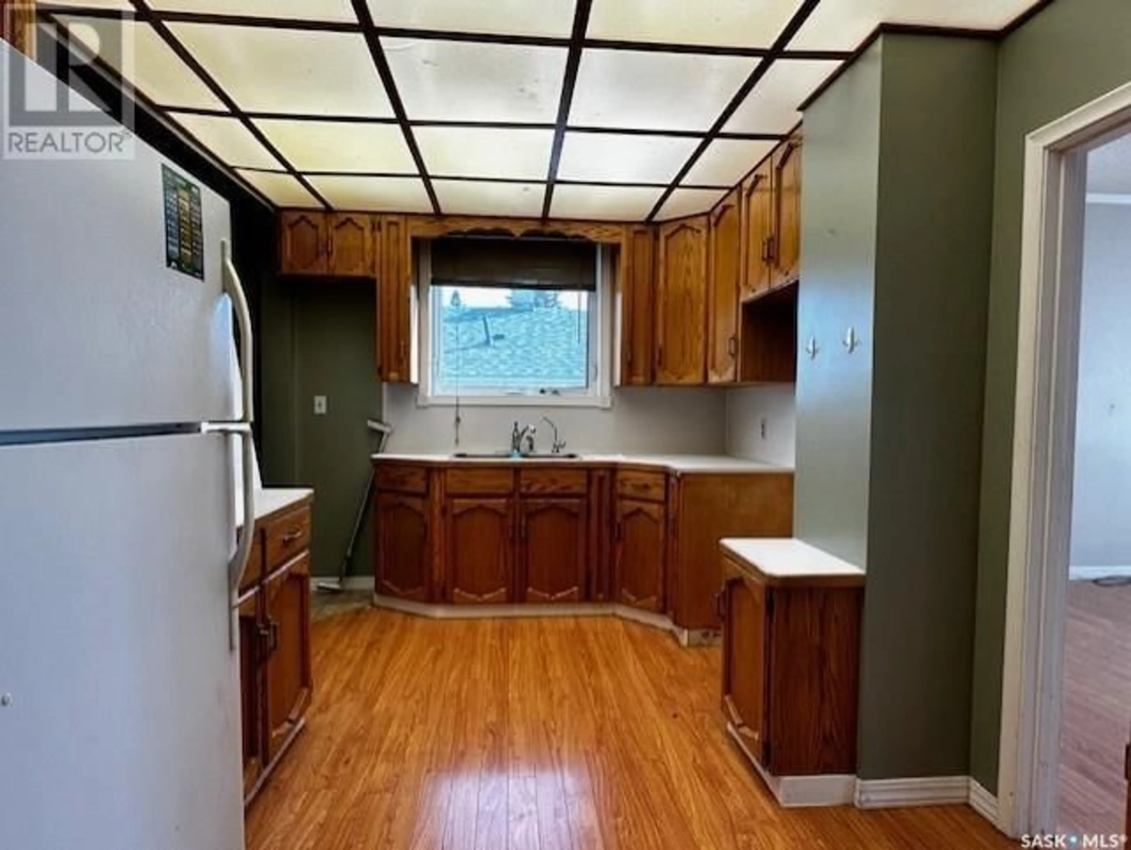 Kitchen, wood floors, cottage for 668 3rd AVENUE W, Melville Saskatchewan S0A2P0