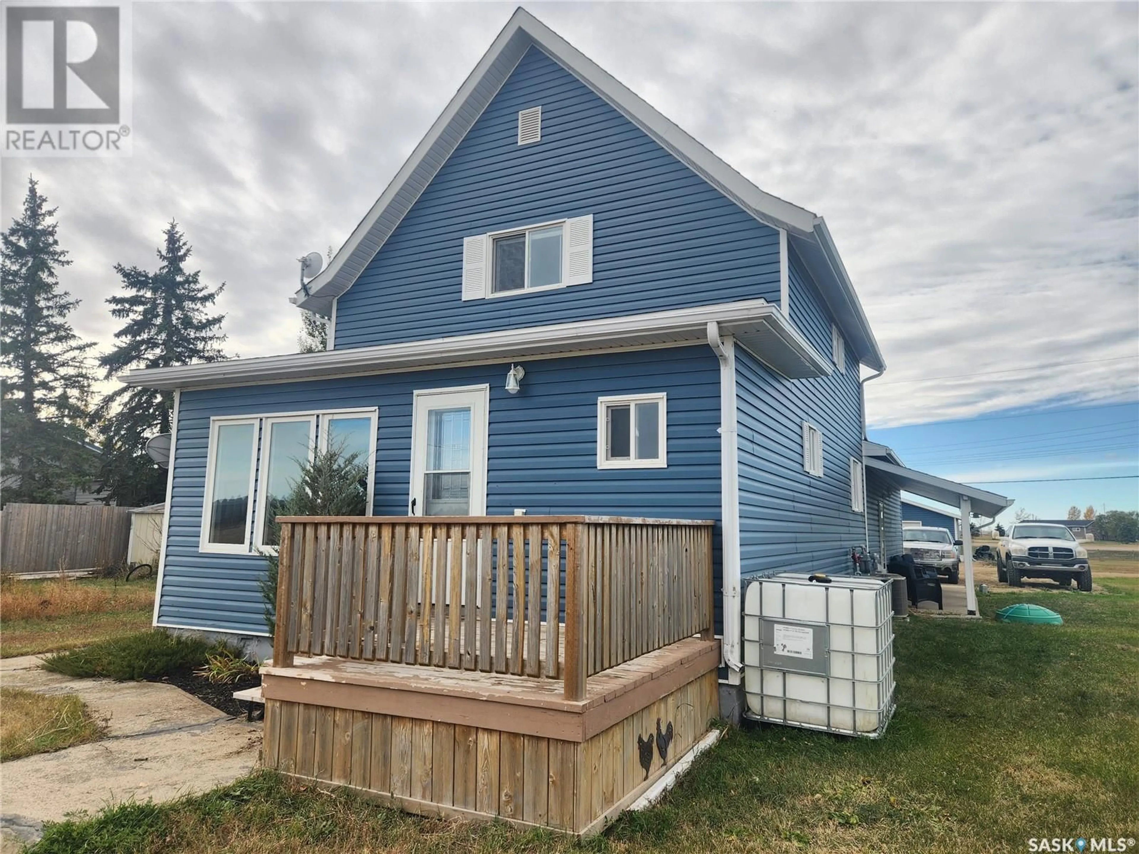 Home with vinyl exterior material, street for 10 DANTON STREET, Tribune Saskatchewan S0C2M0