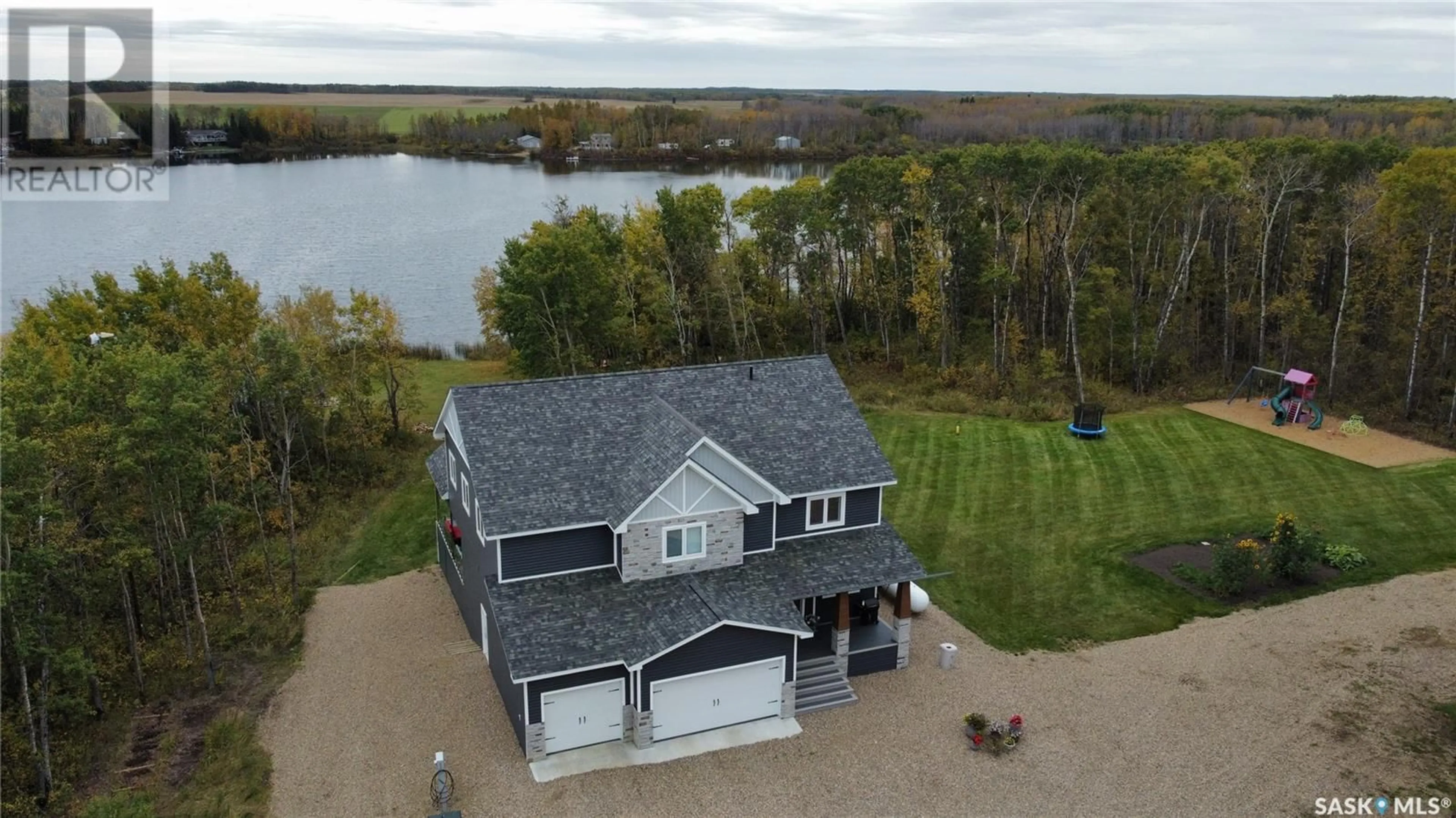 A pic from outside/outdoor area/front of a property/back of a property/a pic from drone, water/lake/river/ocean view for LITTLE LOON ACREAGE, Parkdale Rm No. 498 Saskatchewan S0M0Y0