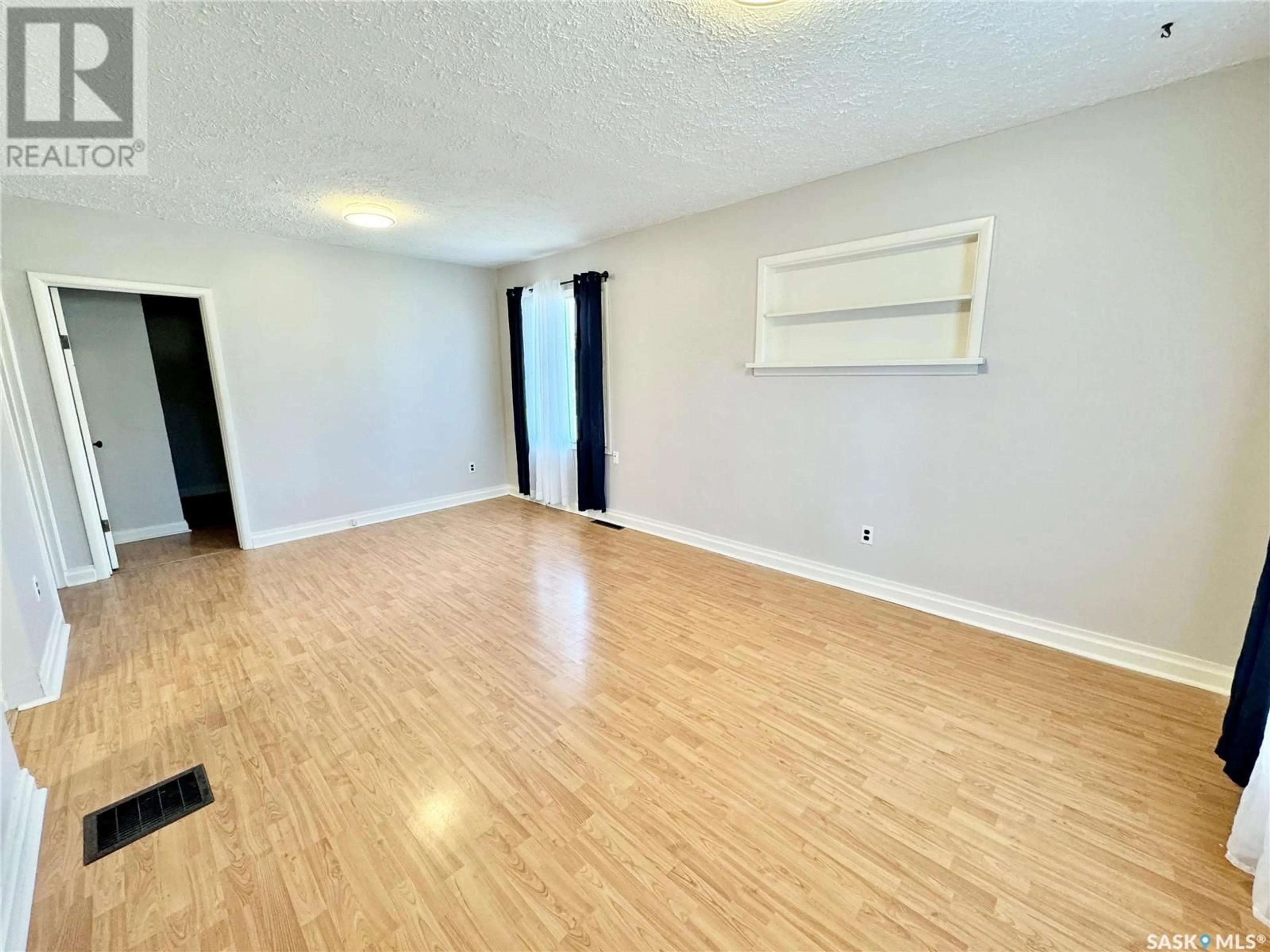 A pic of a room, wood floors for 745 15th STREET W, Prince Albert Saskatchewan S6V3R7