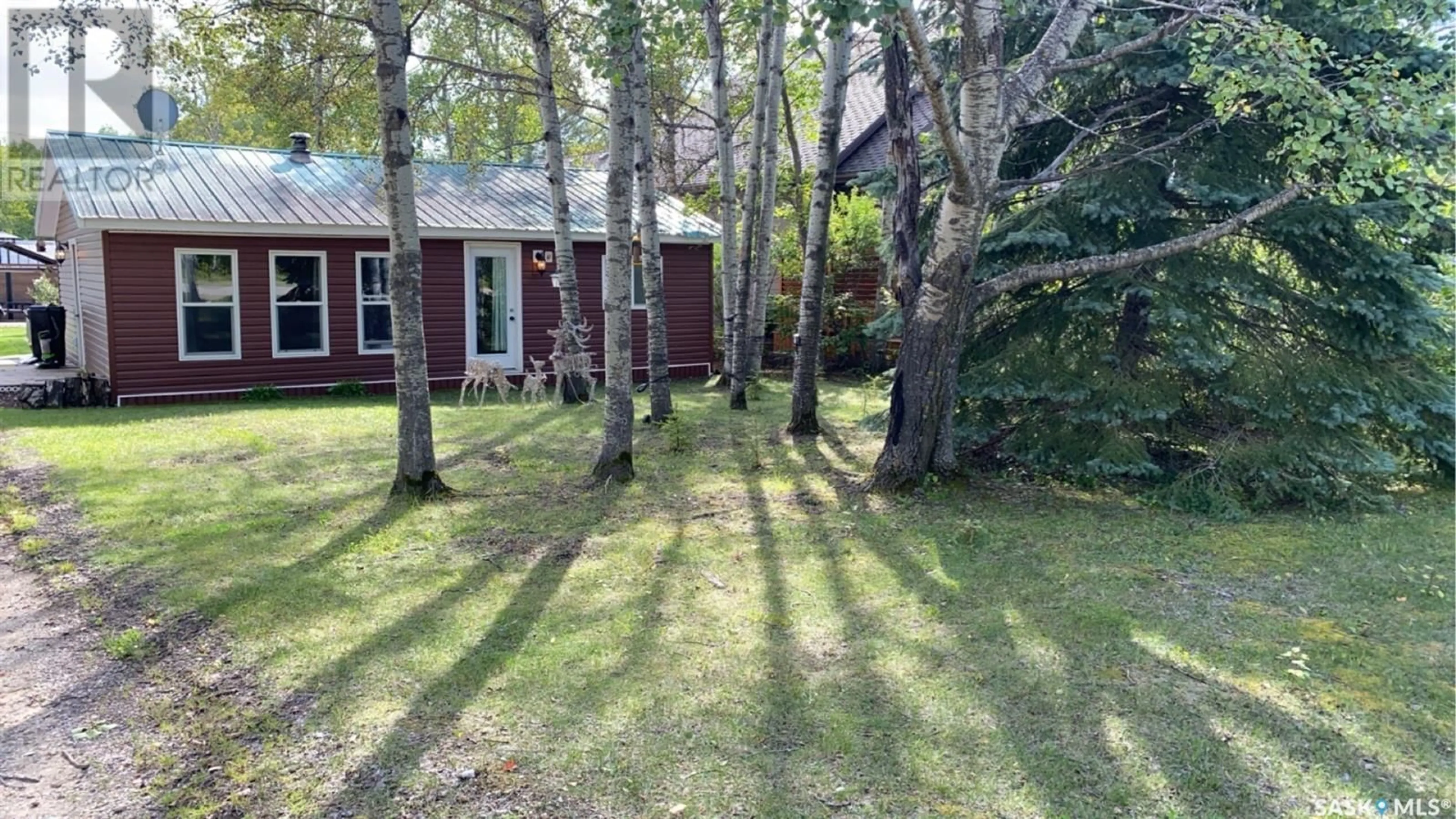 A pic from outside/outdoor area/front of a property/back of a property/a pic from drone, forest/trees view for 15 ARCOLA ROAD, Moose Mountain Provincial Park Saskatchewan S0C0S0