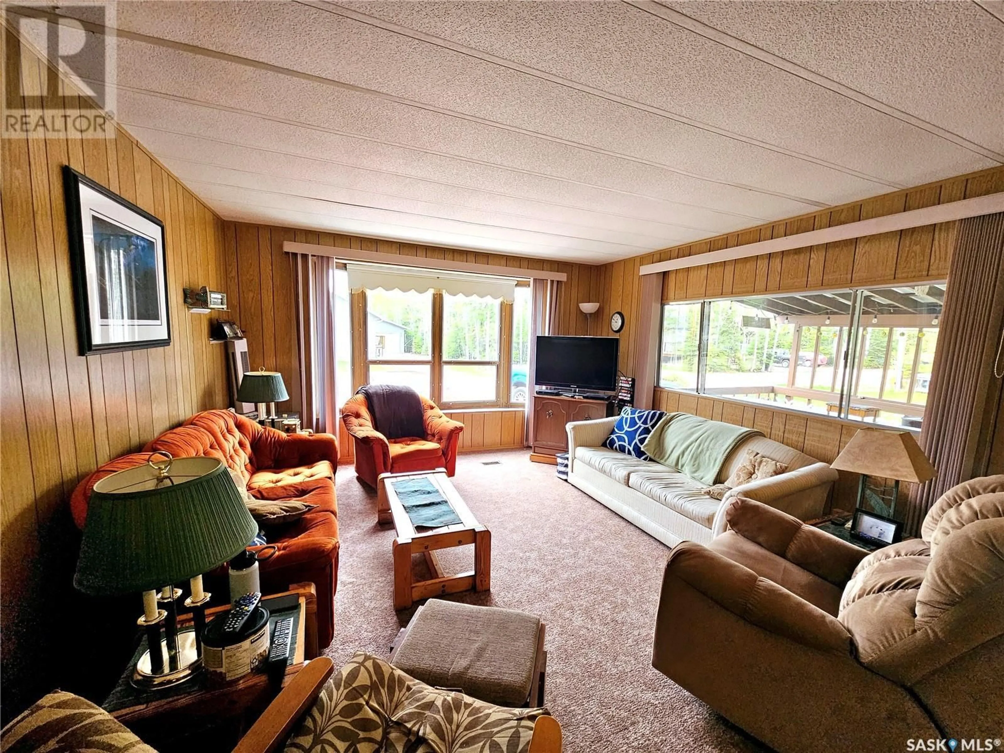 Living room, wood floors for 29 Alder PLACE, Candle Lake Saskatchewan S0J3E0