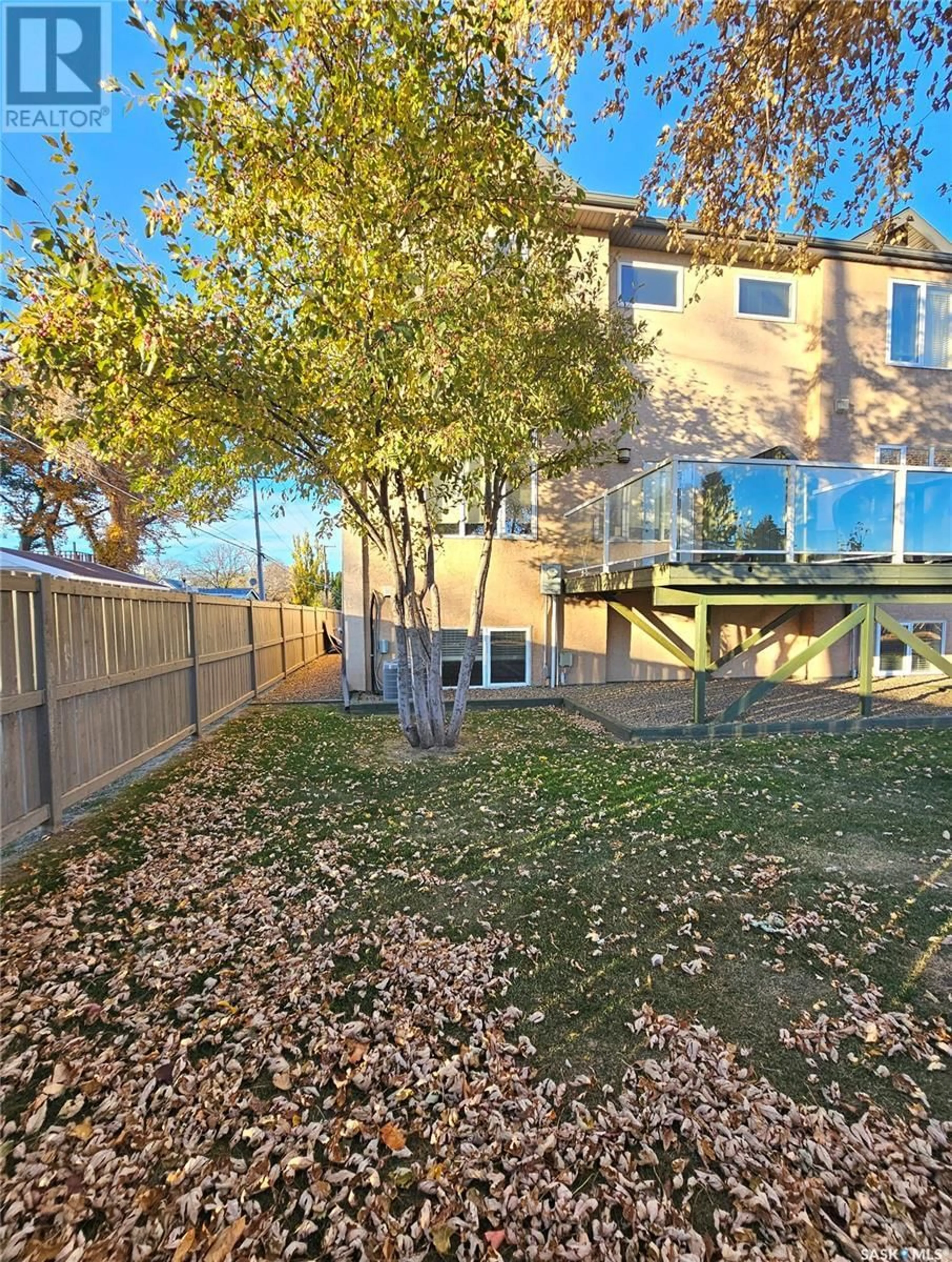 A pic from exterior of the house or condo, the fenced backyard for 31 701 McIntosh STREET E, Swift Current Saskatchewan S9H1H7