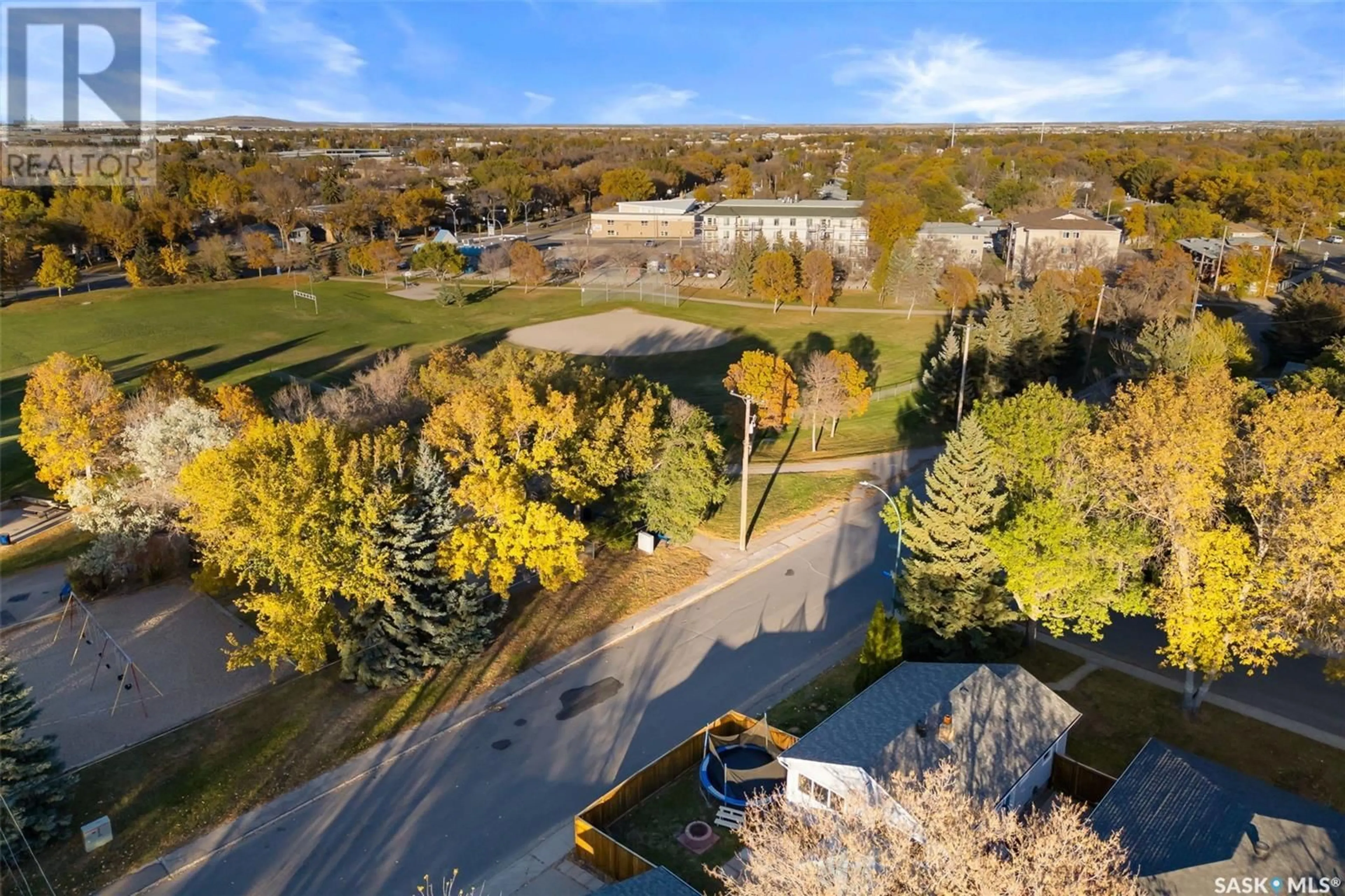 A pic from exterior of the house or condo, the fenced backyard for 2700 Mackay STREET, Regina Saskatchewan S4N2T7