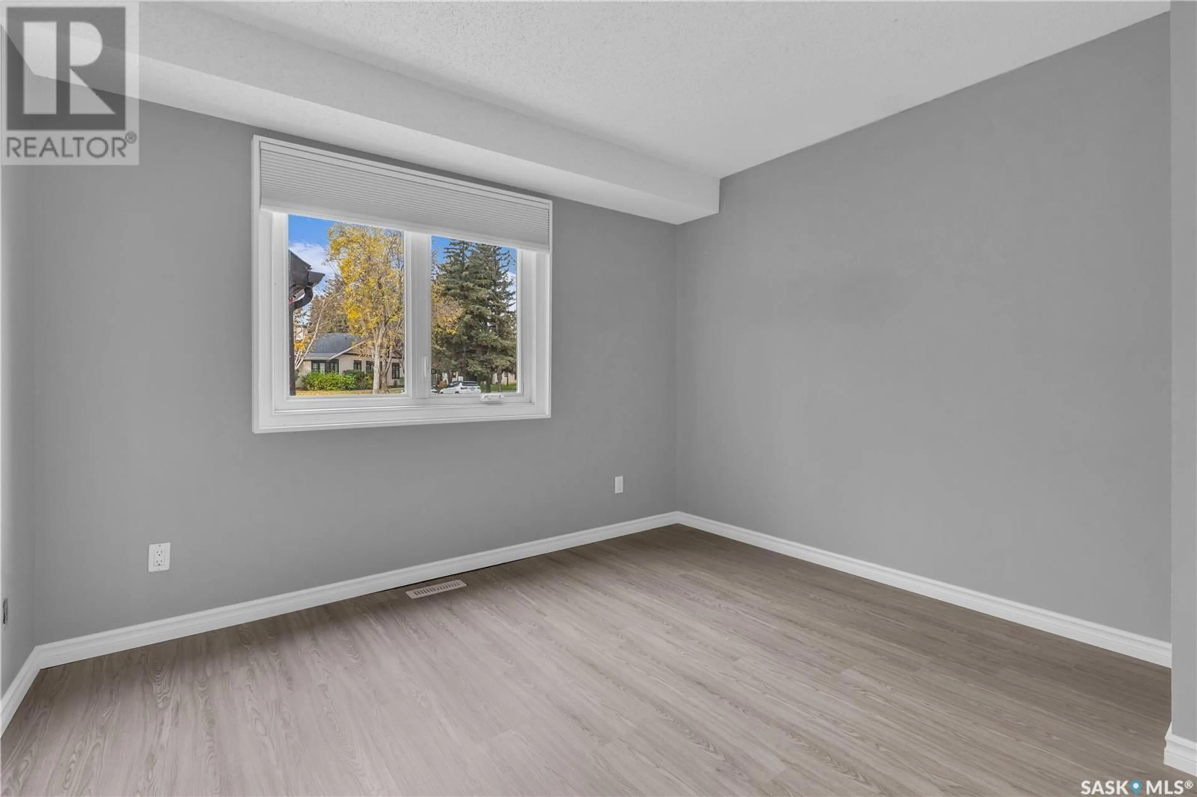 A pic of a room, wood floors for 1024 Gryphons WALK, Regina Saskatchewan S4S6X1