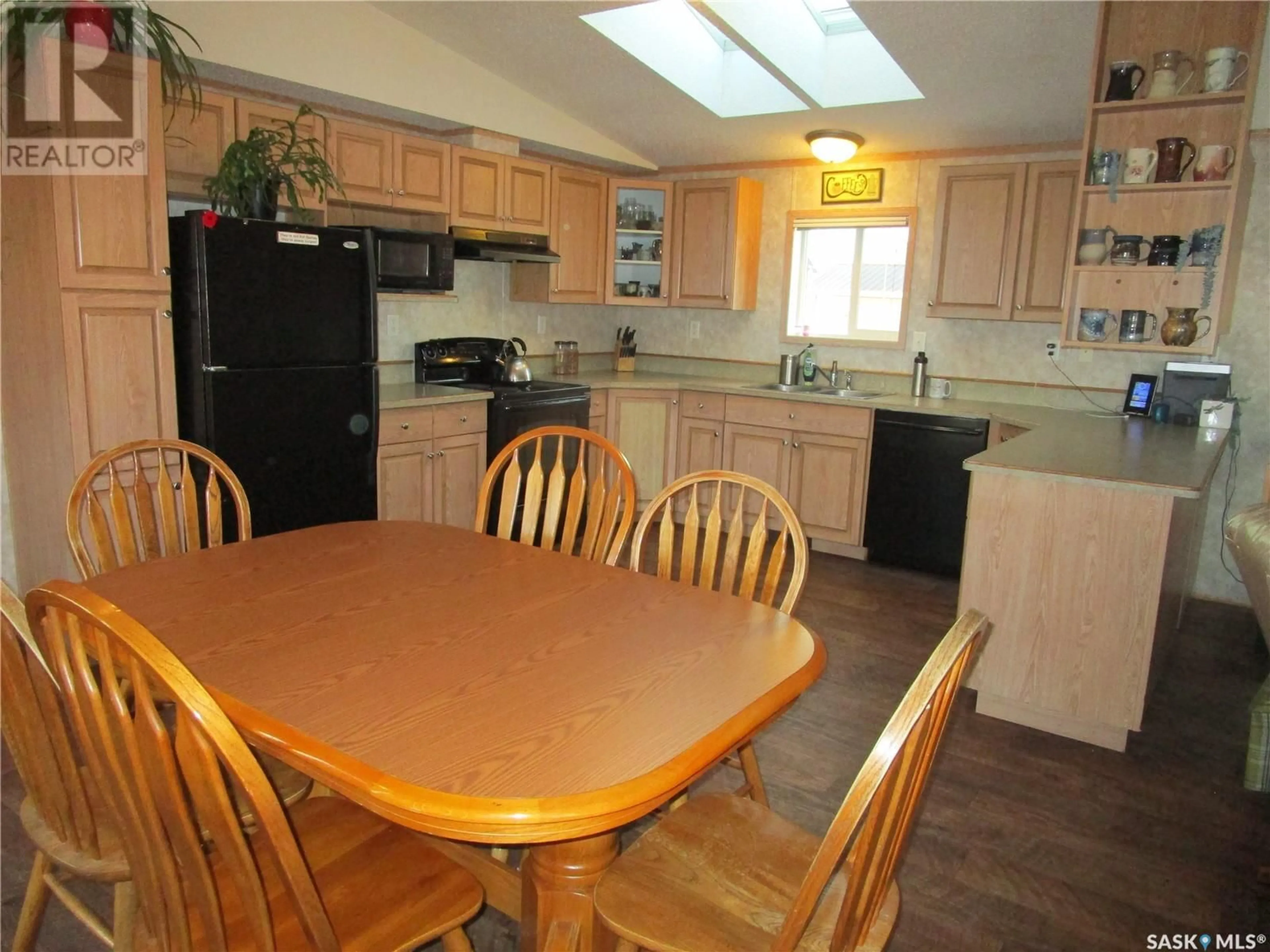 Kitchen, wood floors, cottage for 514 3rd AVENUE, Wood Mountain Saskatchewan S0H4L0