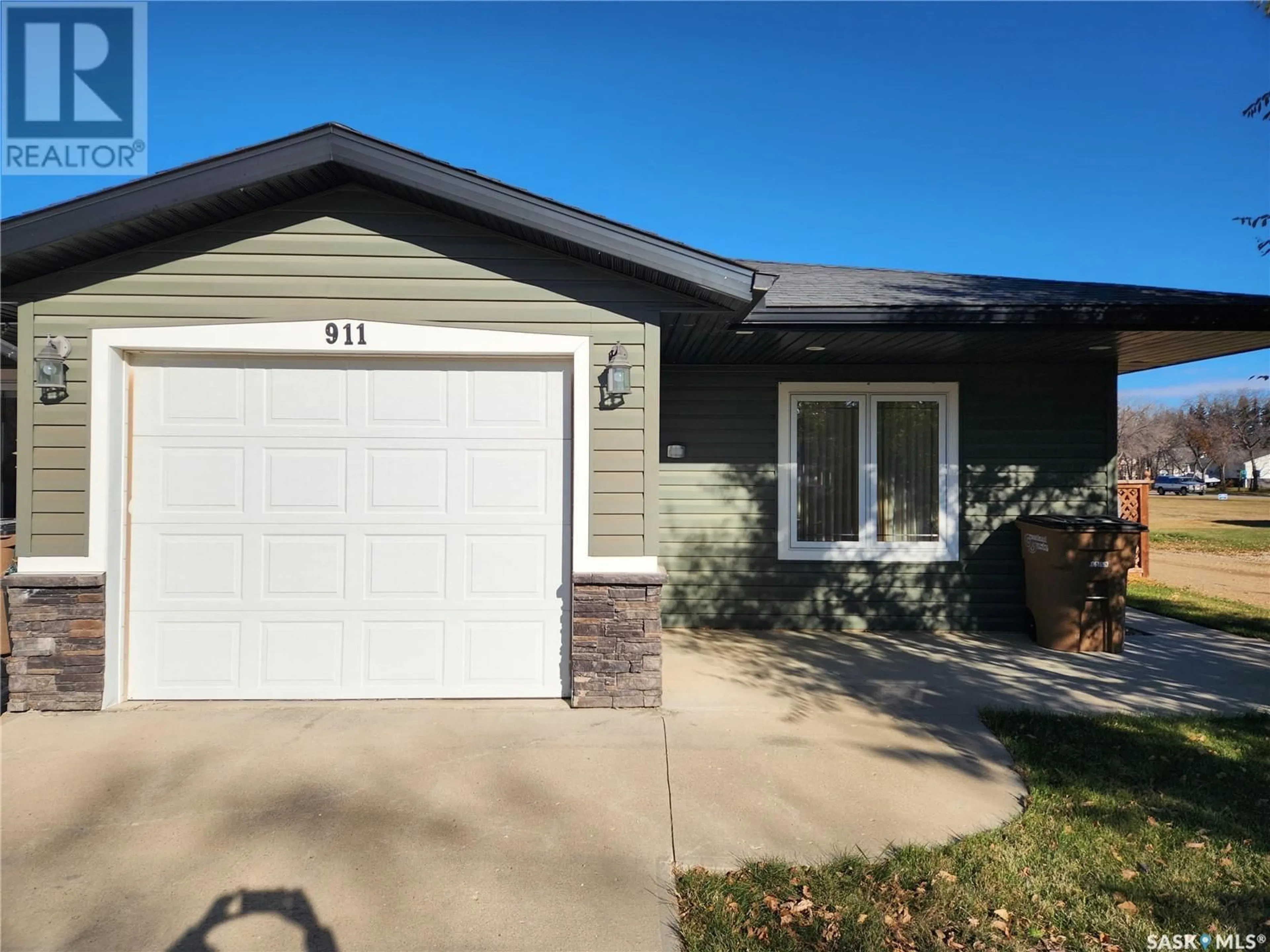 Frontside or backside of a home, the street view for 911 108TH AVENUE, Tisdale Saskatchewan S0E1T0