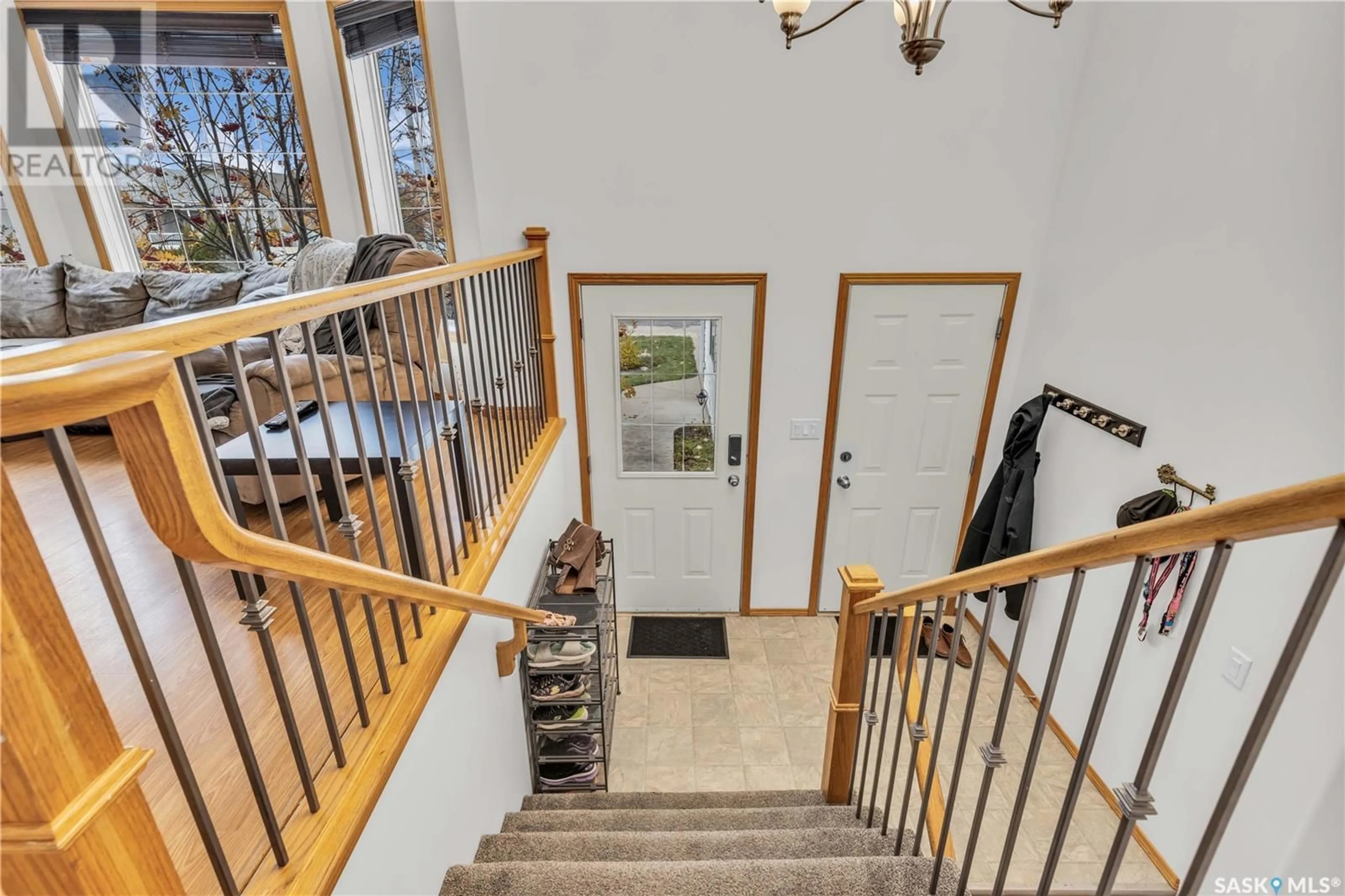 Indoor foyer, wood floors for 501B ENS LANE, Warman Saskatchewan S0K4S0