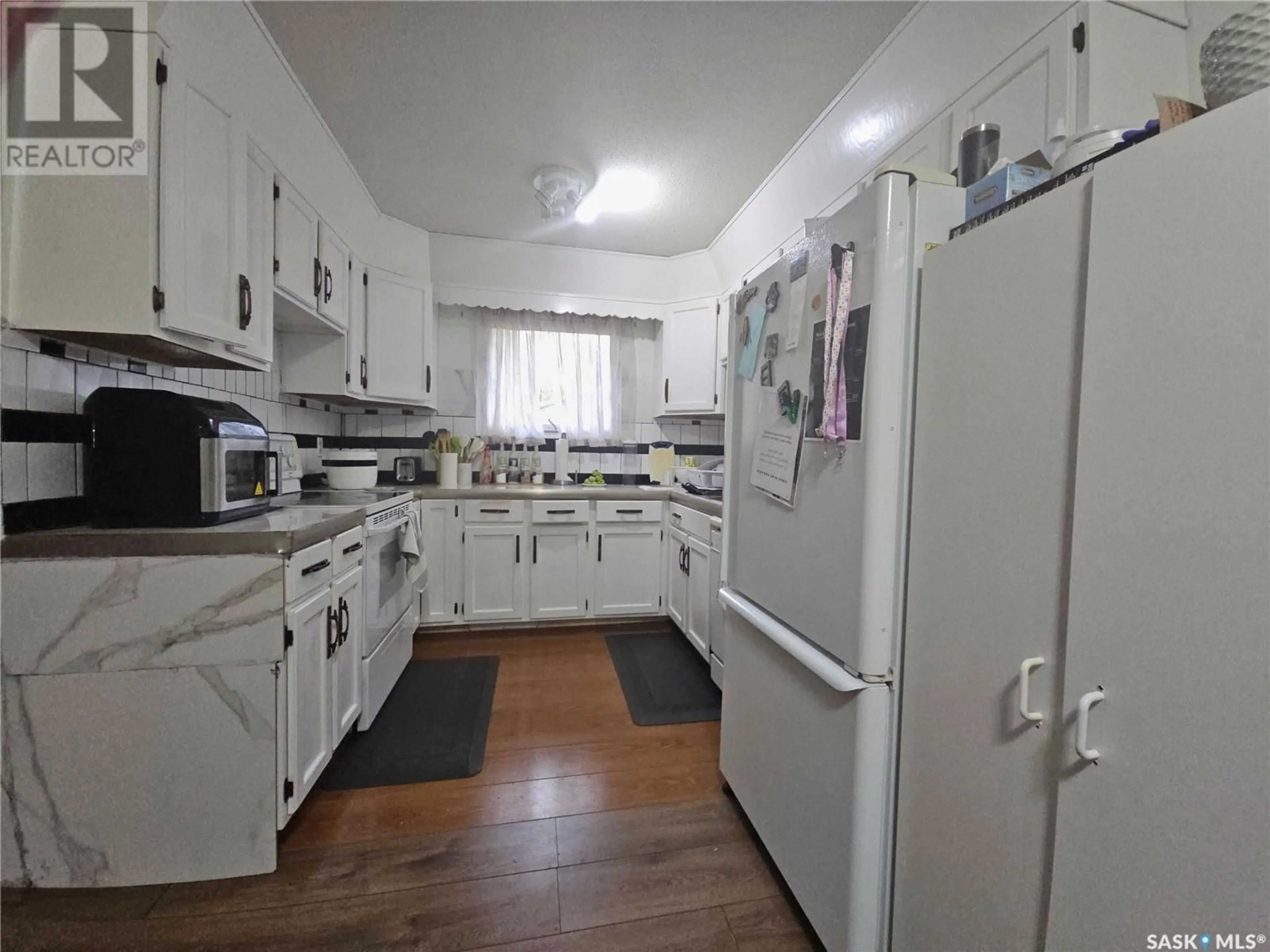 Kitchen, wood floors, cottage for 1512 110th STREET, North Battleford Saskatchewan S9A2J4