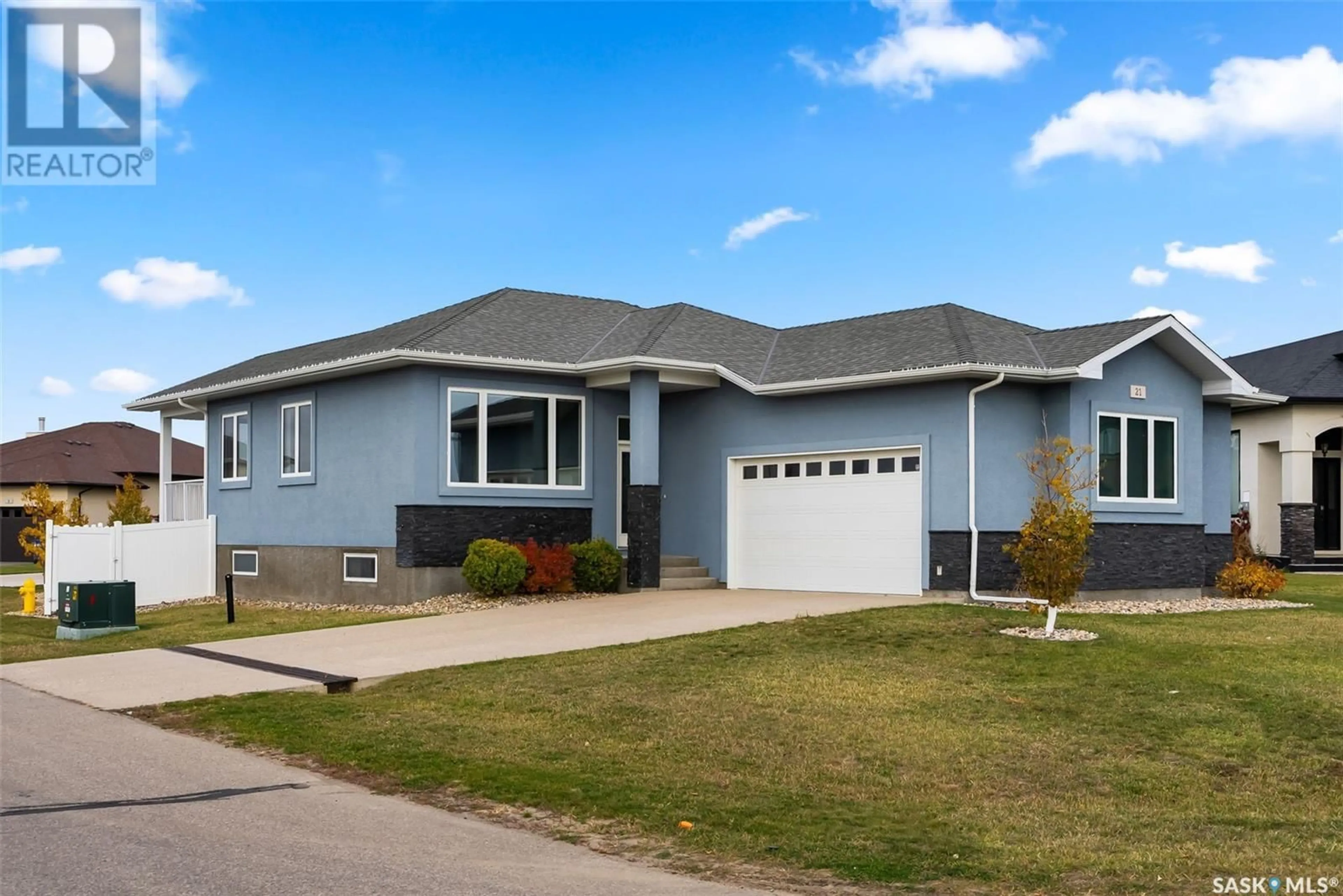 Frontside or backside of a home, cottage for 21 College CRESCENT, White City Saskatchewan S4L0C6