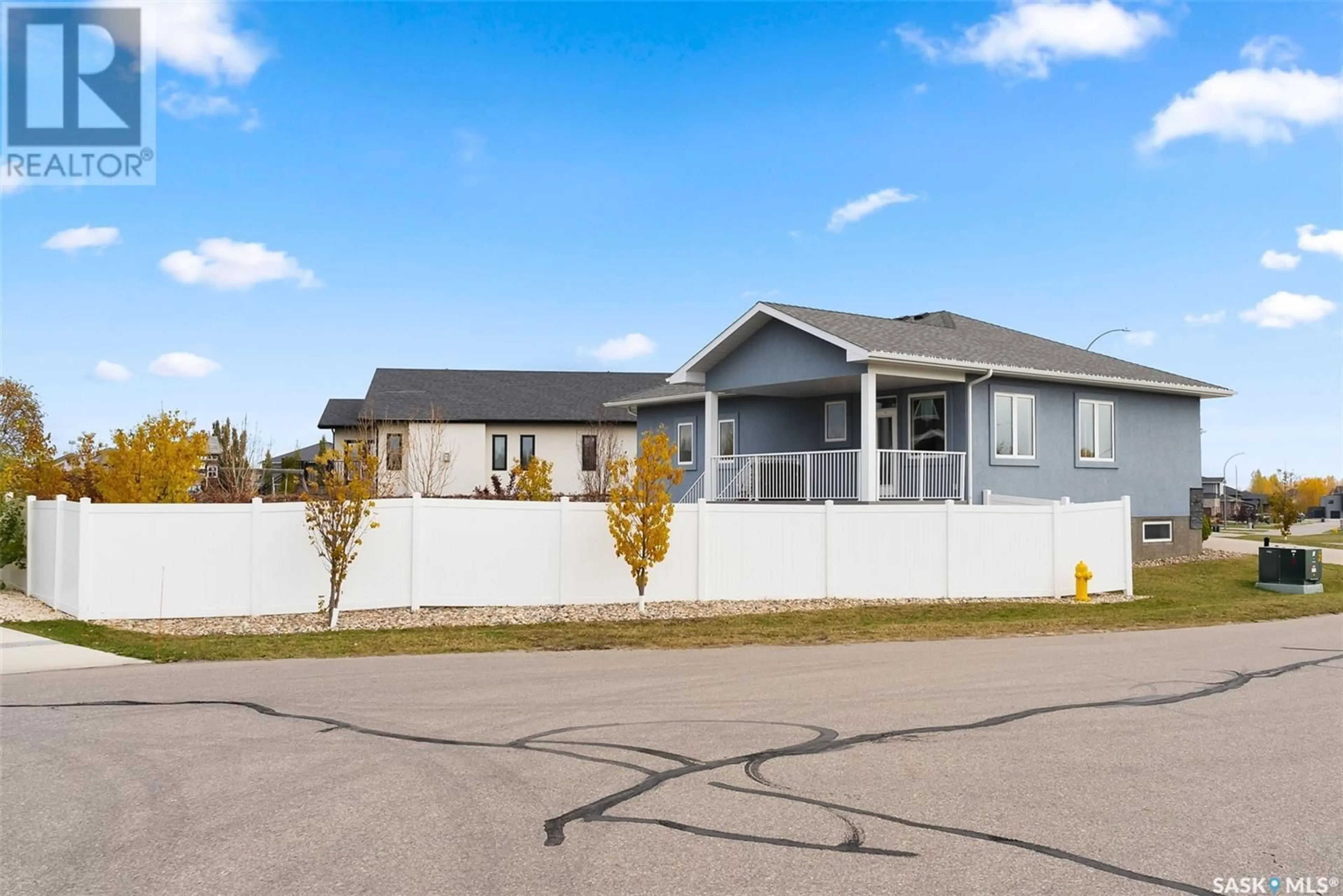 Frontside or backside of a home, the front or back of building for 21 College CRESCENT, White City Saskatchewan S4L0C6