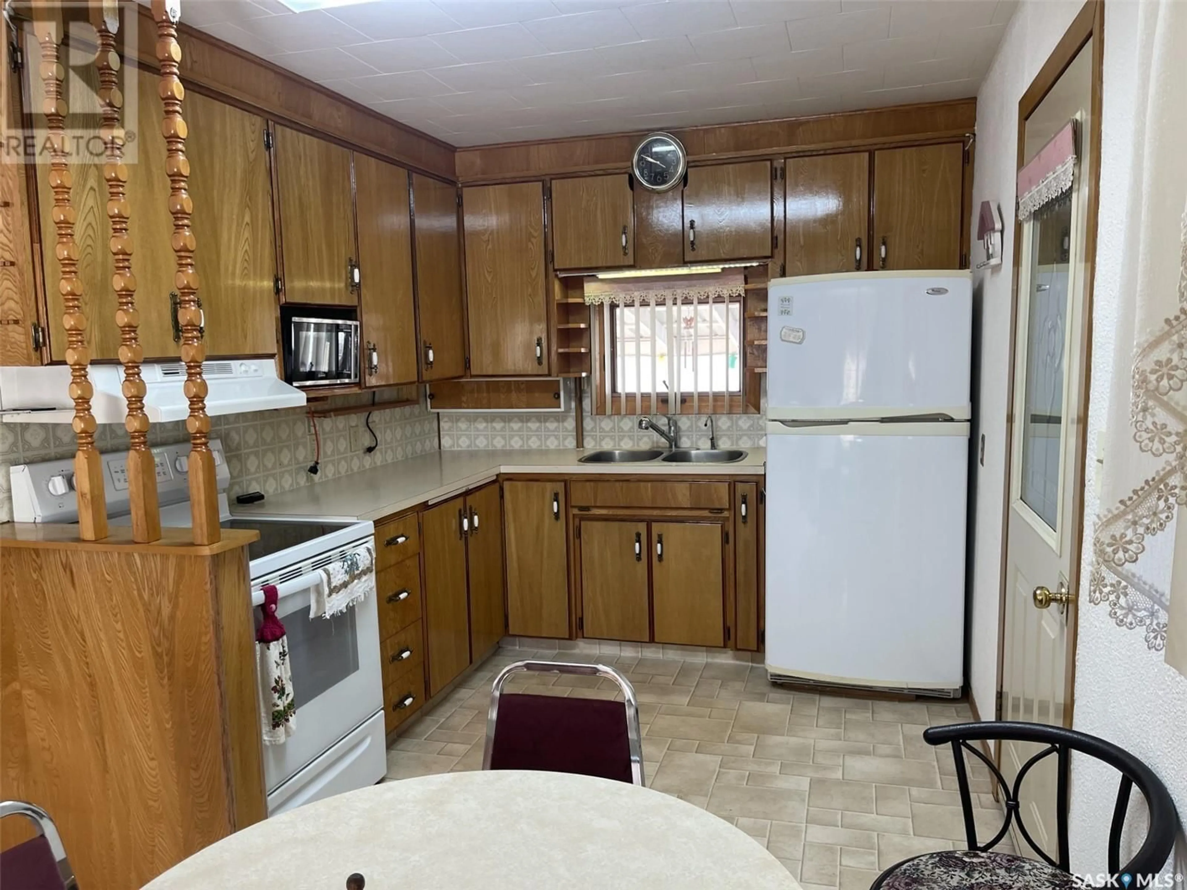 Standard kitchen, cottage for 58 Helena STREET, Prud'homme Saskatchewan S0K3K0