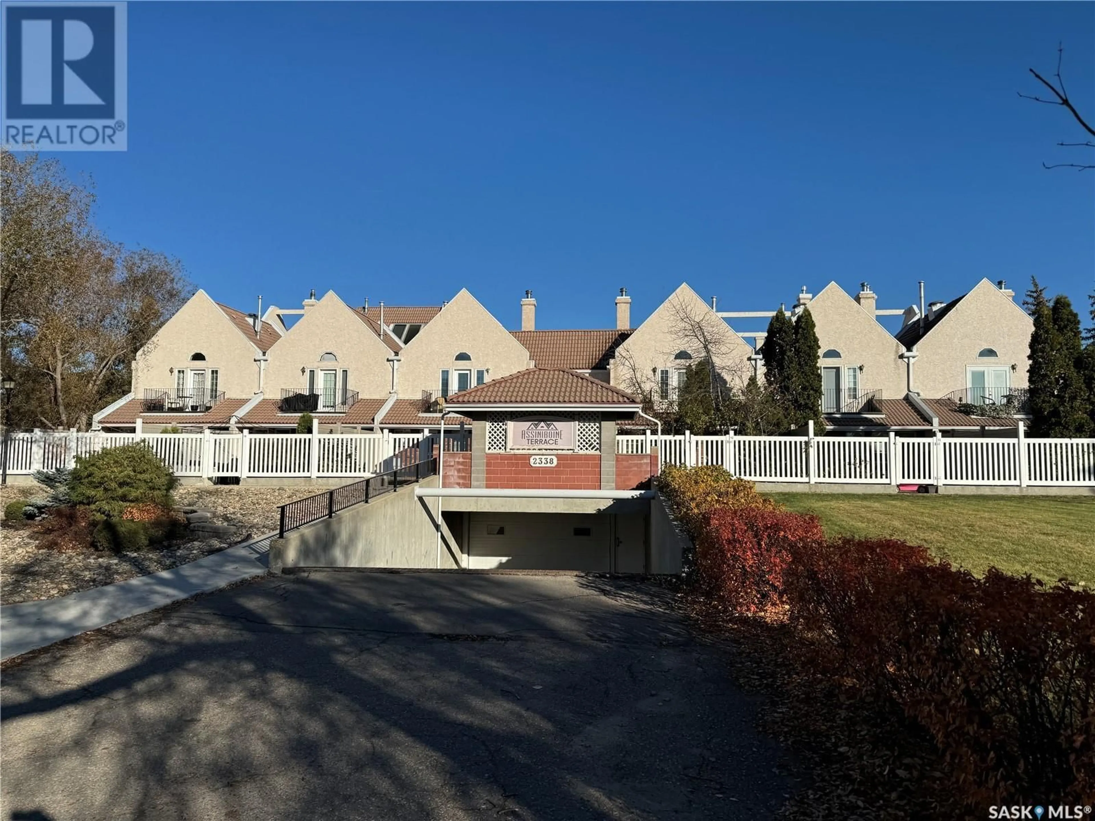 A pic from exterior of the house or condo, the fenced backyard for 26 2338 Assiniboine AVENUE E, Regina Saskatchewan S4V2G2