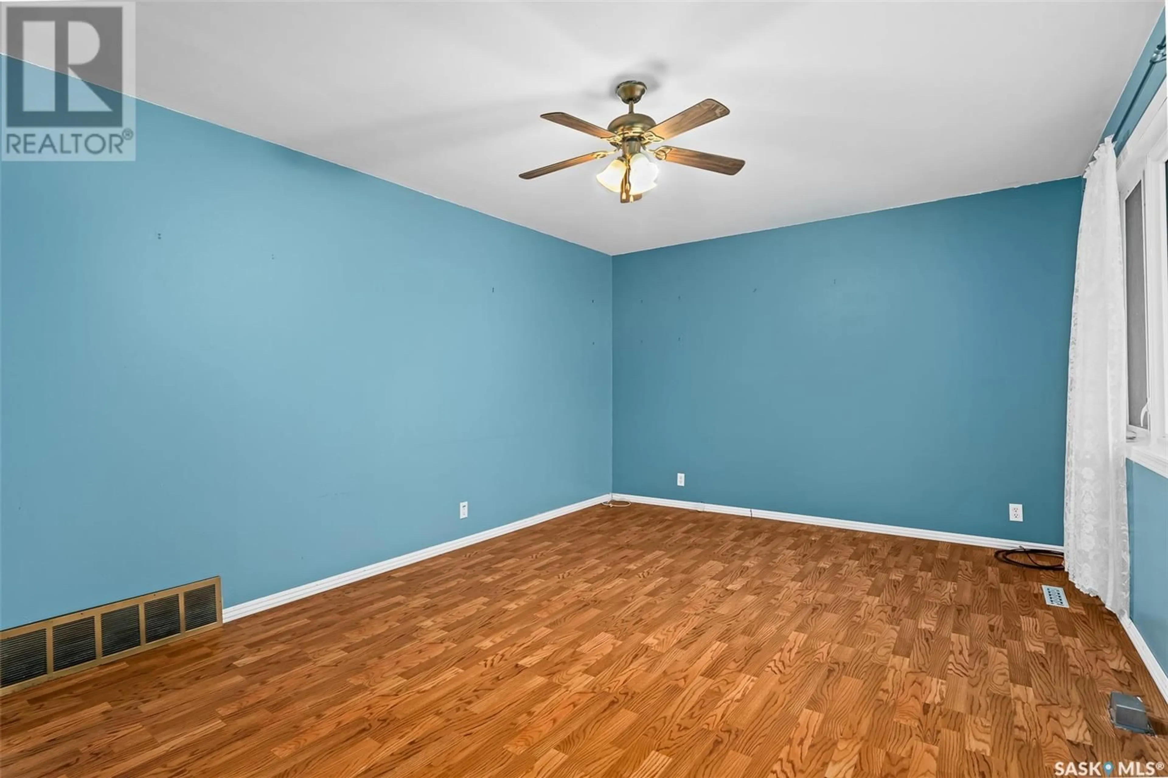 A pic of a room, wood floors for 124 2nd AVENUE, Mortlach Saskatchewan S0H3E0