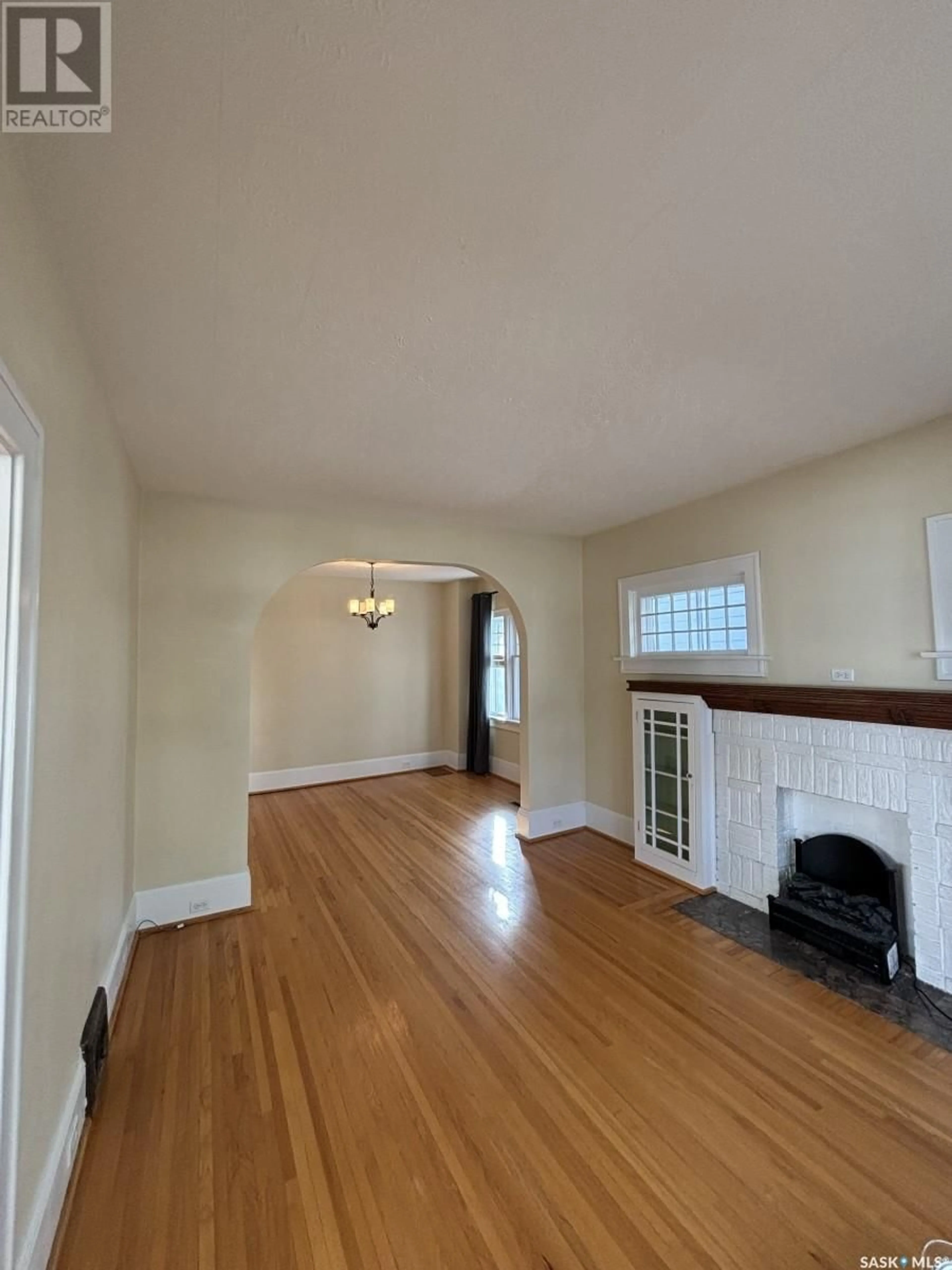 A pic of a room, wood floors for 76 Angus CRESCENT, Regina Saskatchewan S4T6N2